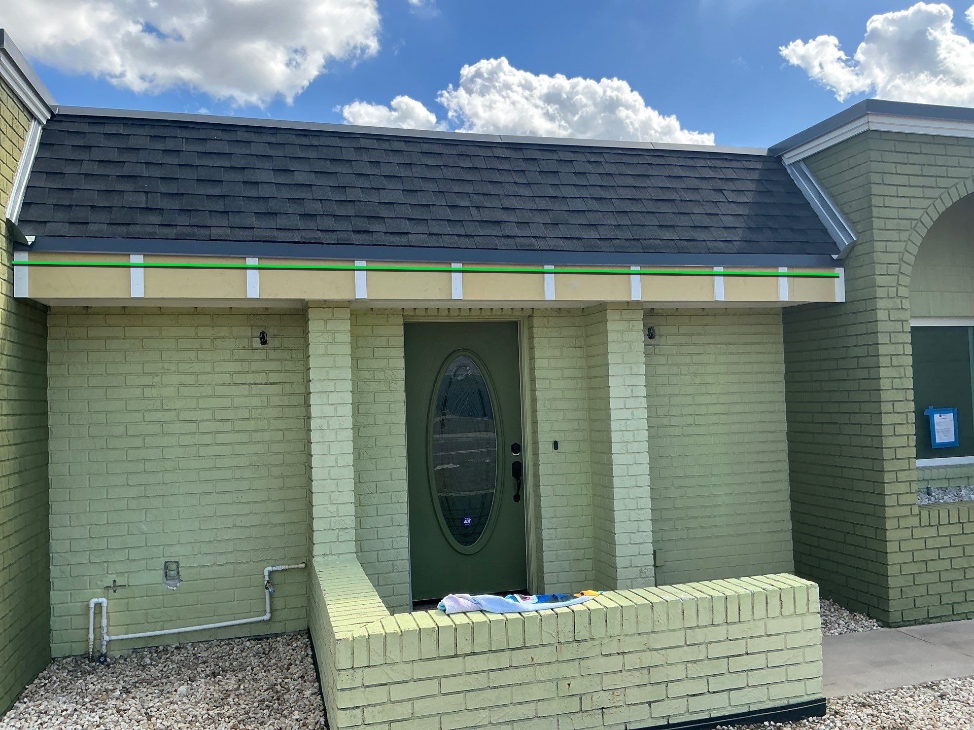 Black 6'' Seamless Gutters K-Style and Black Downspouts in Sun City Center FL by Gutter Professors