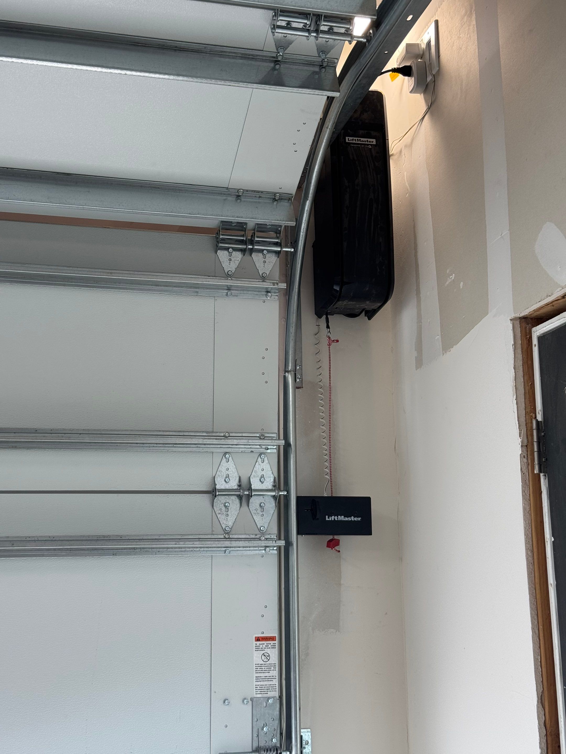 Modern CHI Cedar Garage Door and LiftMaster Opener in Trophy Club by Meadows Garage Doors