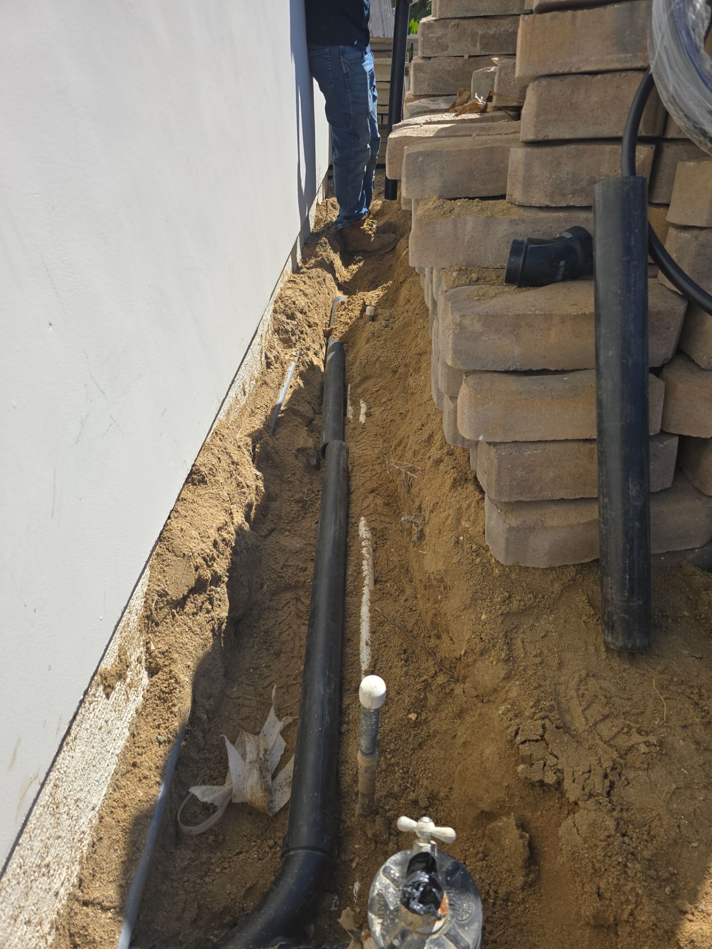 Installing Exterior Water House Line Piping by Us Plumbing