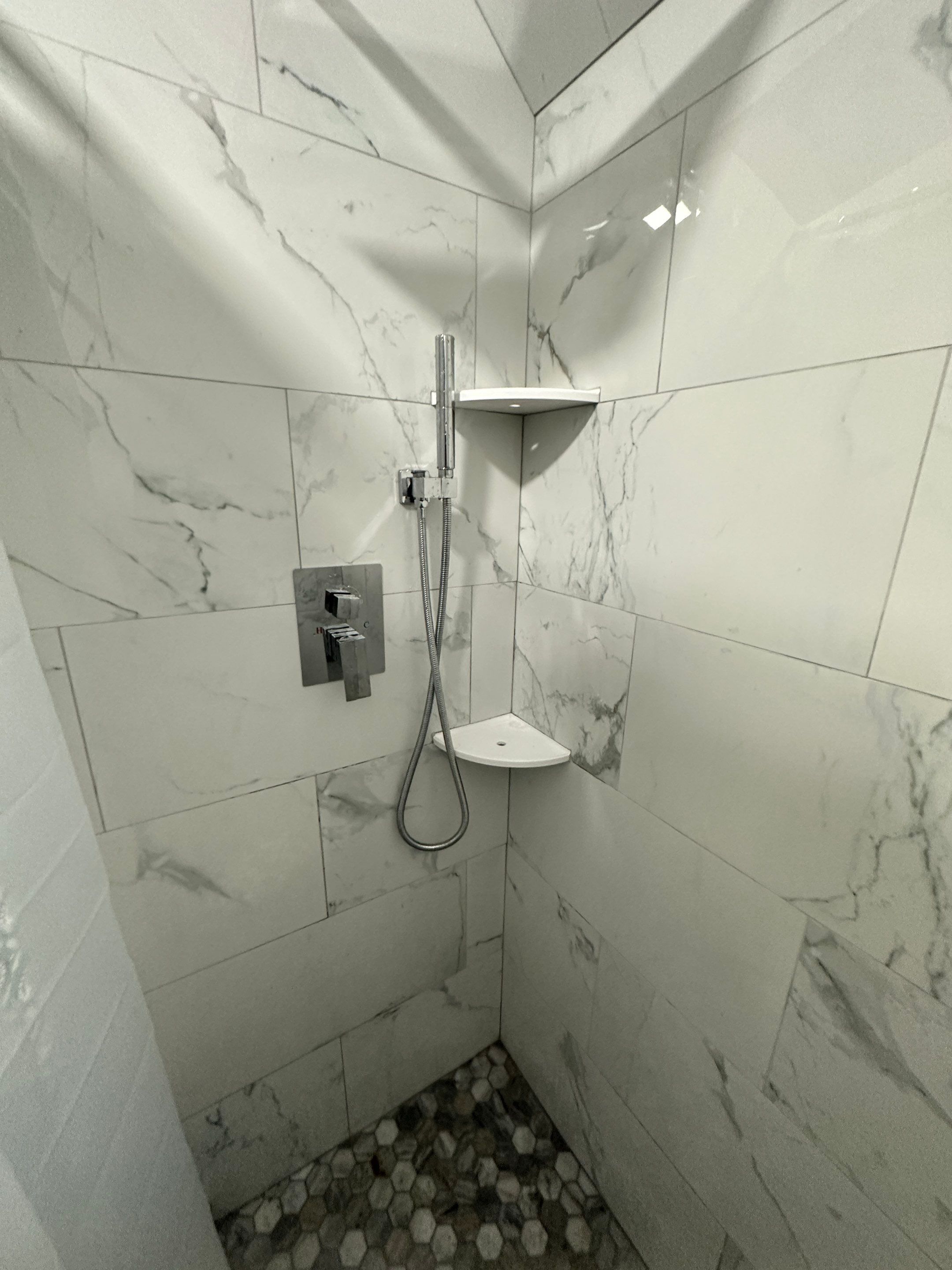 Bathroom Remodel using Tile by Home Concepts Construction