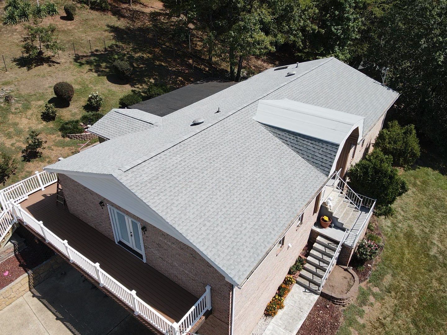 Residential Roofing Installation using GAF Timberline HDZ Fox Hollow Grey by Rainstoppers Roofing