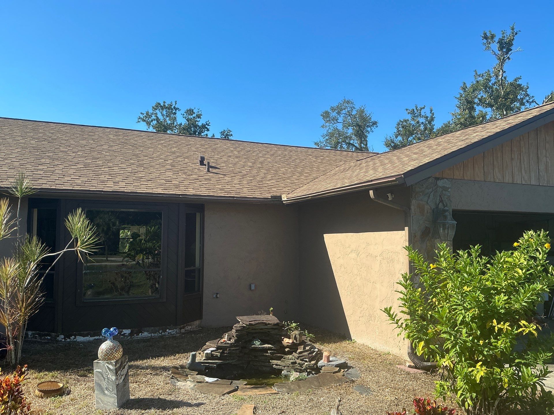 Brown Seamless Gutters for Beach Cottages in Sarasota FL by Gutter Professors