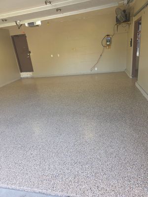 Residential Garage Epoxy Floor Coating Installation in Sioux Falls