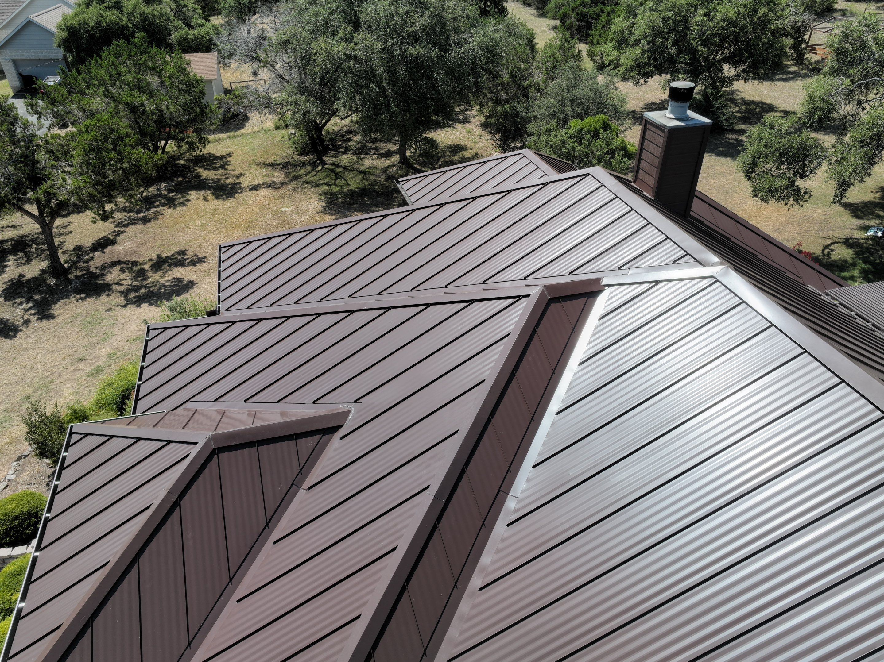 Residential Metal Roof Installation using McElroy Metal by Premier Roofing and Contracting