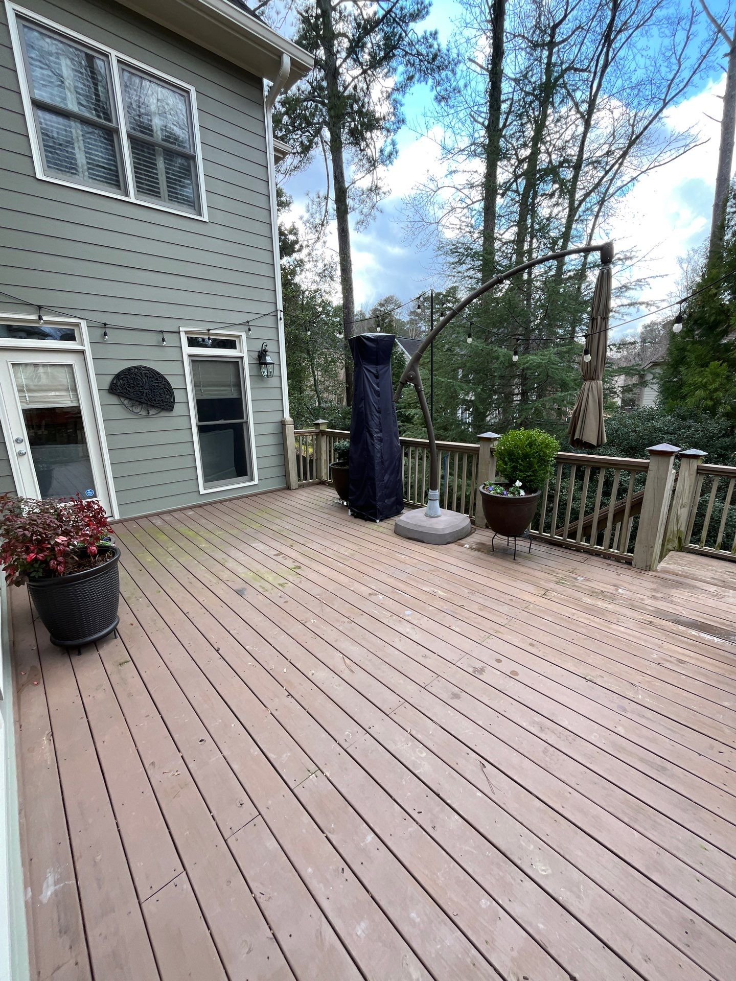 Tucker, GA Covered Porch Build and Deck Replacement using Deckorators Voyage Series Decking by Nelson Exteriors 