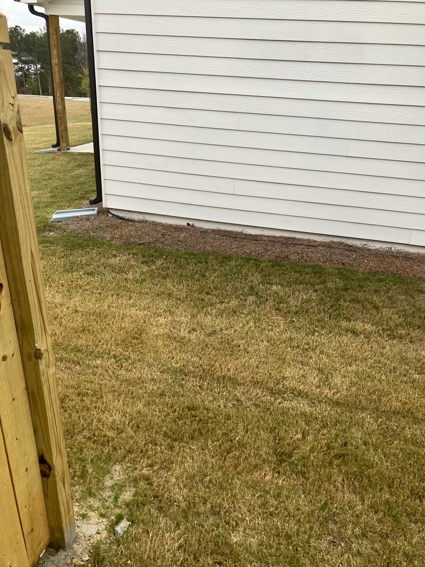 Fence Installation of Capped Wood Privacy with dado cut posts by Titans of Timber Fence & Stain