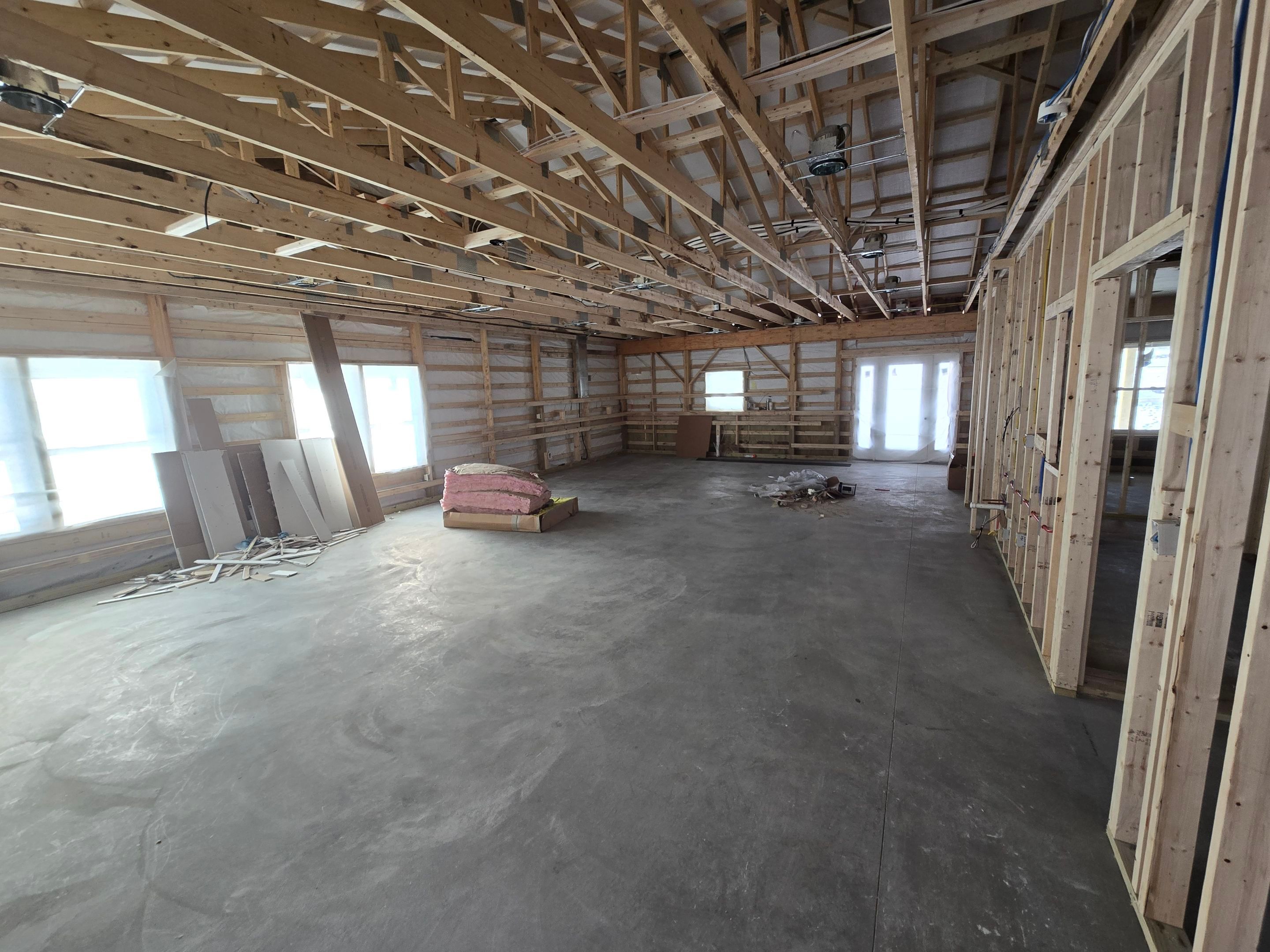Barndominium  using Textured Board & Batton by Horst Custom Homes 