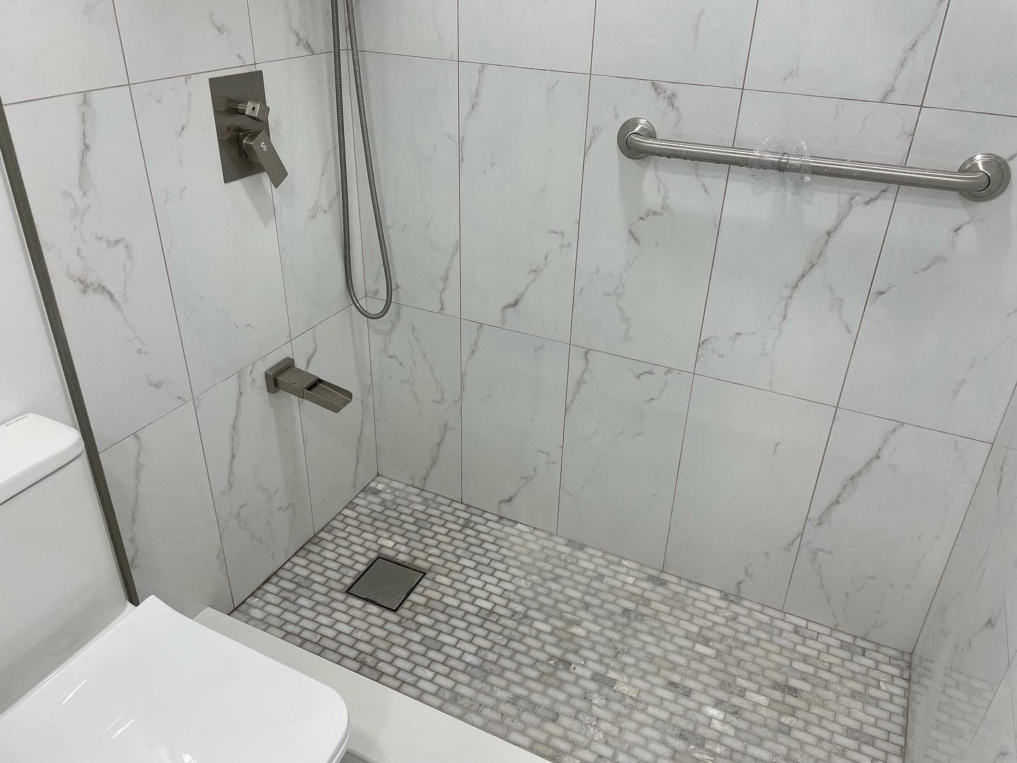 Bathroom Remodel using Tile by Home Concepts Construction