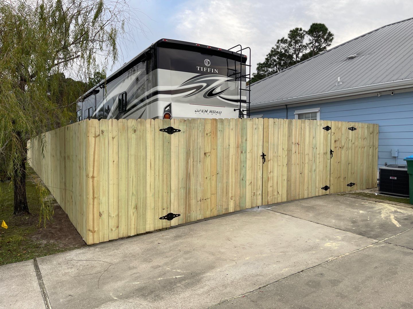 6' WOOD PRIVACY WITH 14' DOUBLE DRIVE GATE using PRESSURE TREATED PINE by Hip Square Fence Inc.