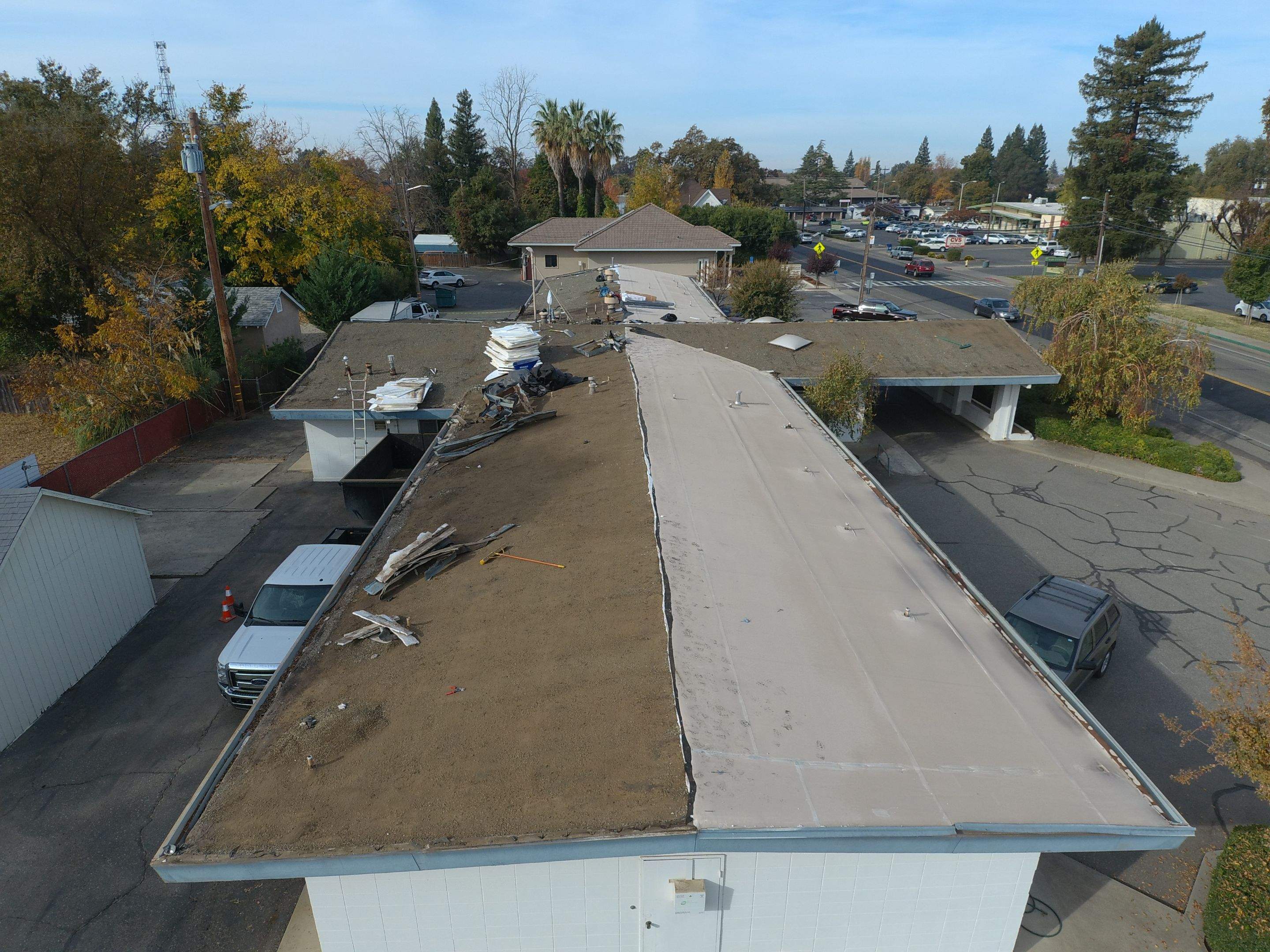 Spray foam and coatings using Conklin Benchmark/PUMA XL coatings and spray foam by Straight Edge Roofing Inc