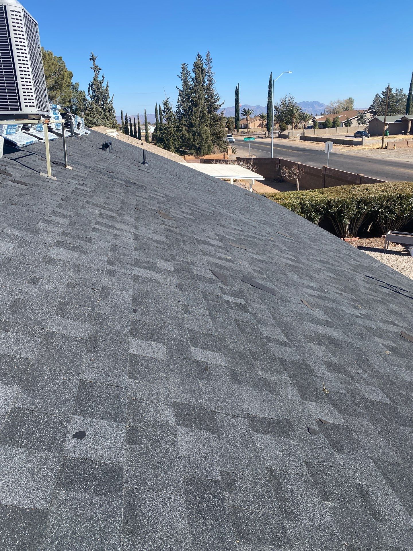 Onyx Black Shingles by Reimagine Roofing