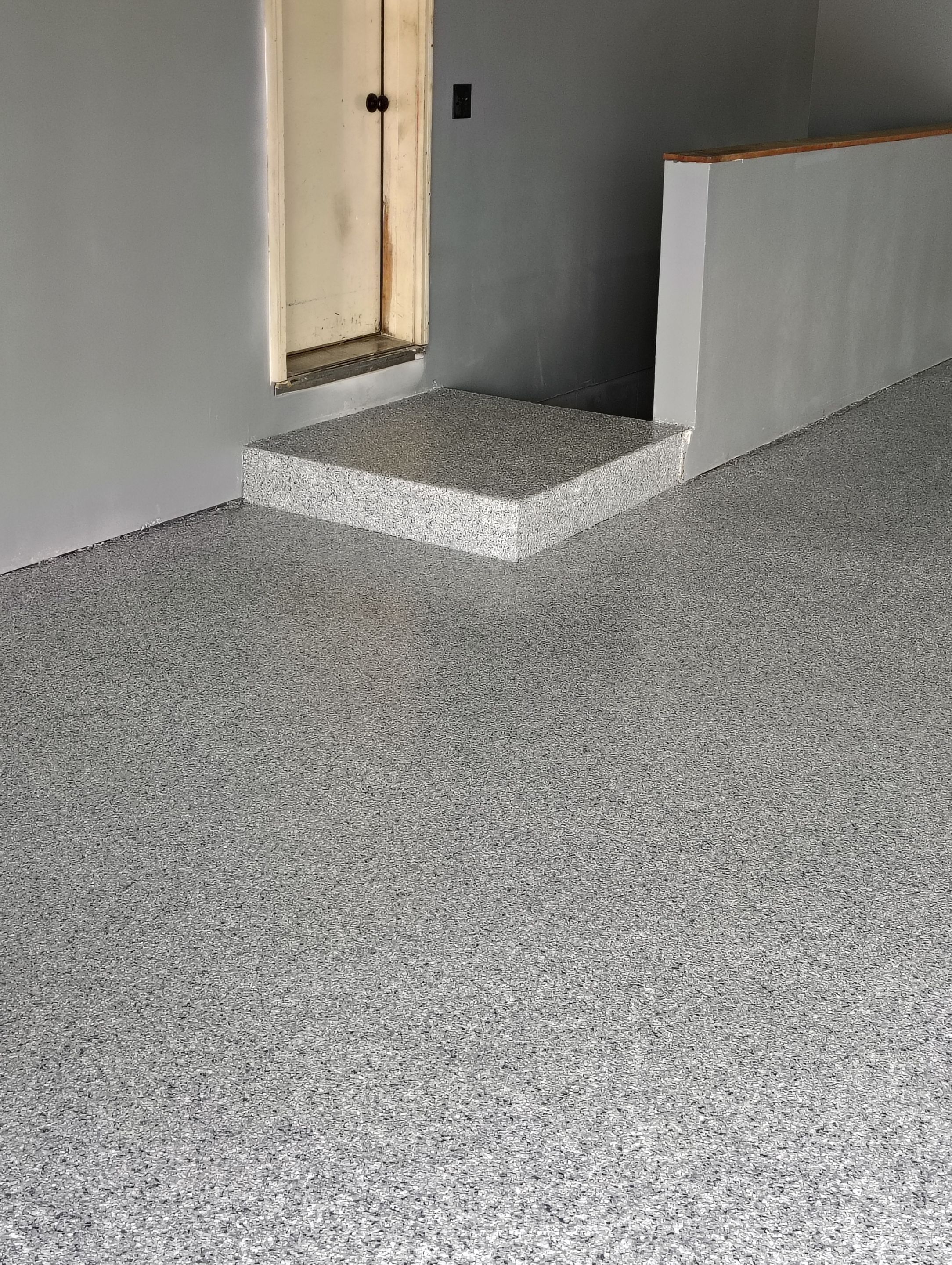 Garage Floor Concrete Coating and Surface Restoration in Colman by Select Painting, Coatings & Garage Cabinets