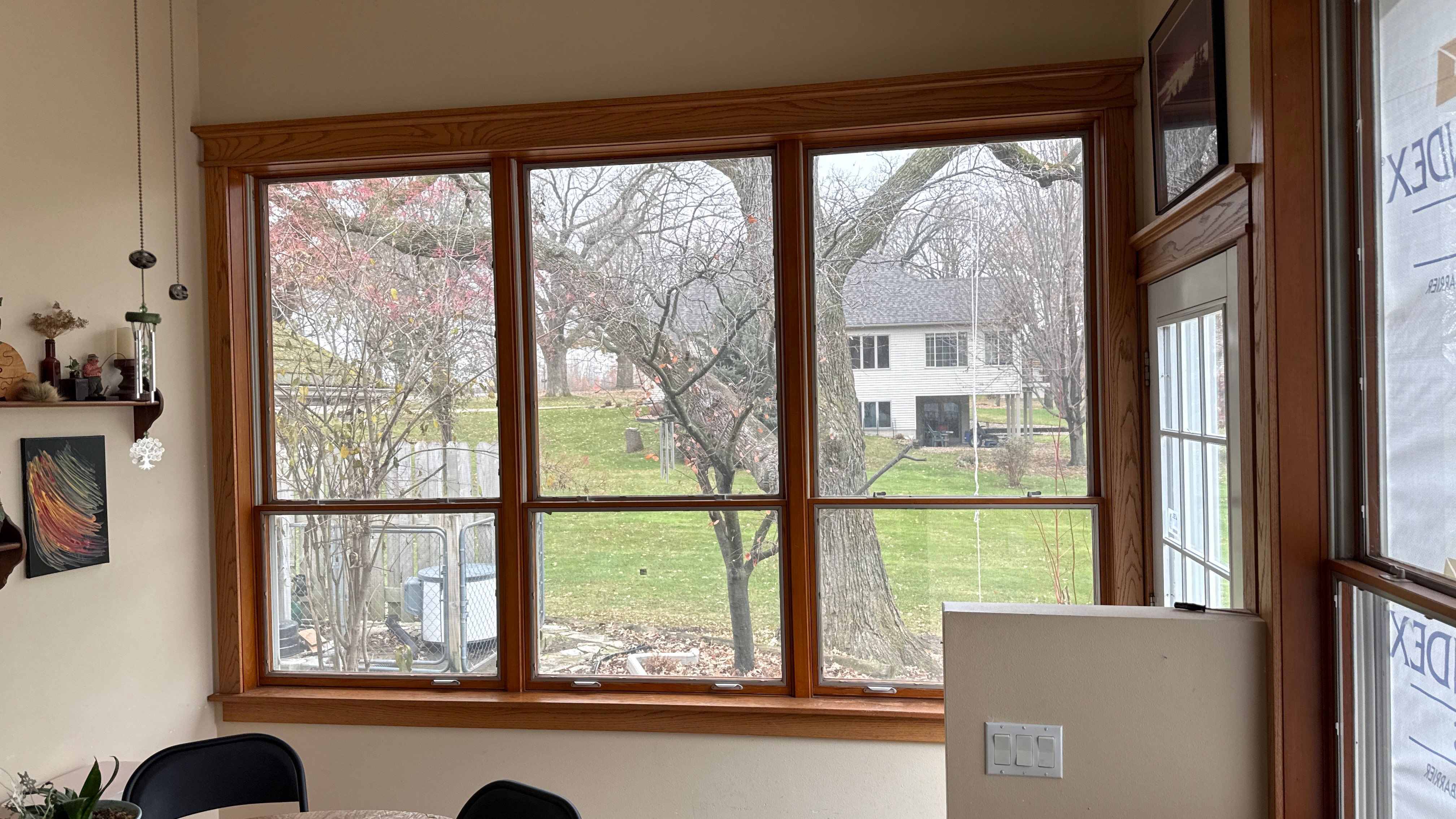 A Clean Window Upgrade Ready for New Siding with Pella Lifestyle Series by United Windows and Siding LLC