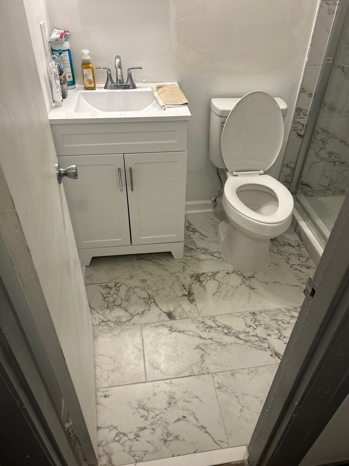 Dual Bathroom Makeover by urban green energy llc