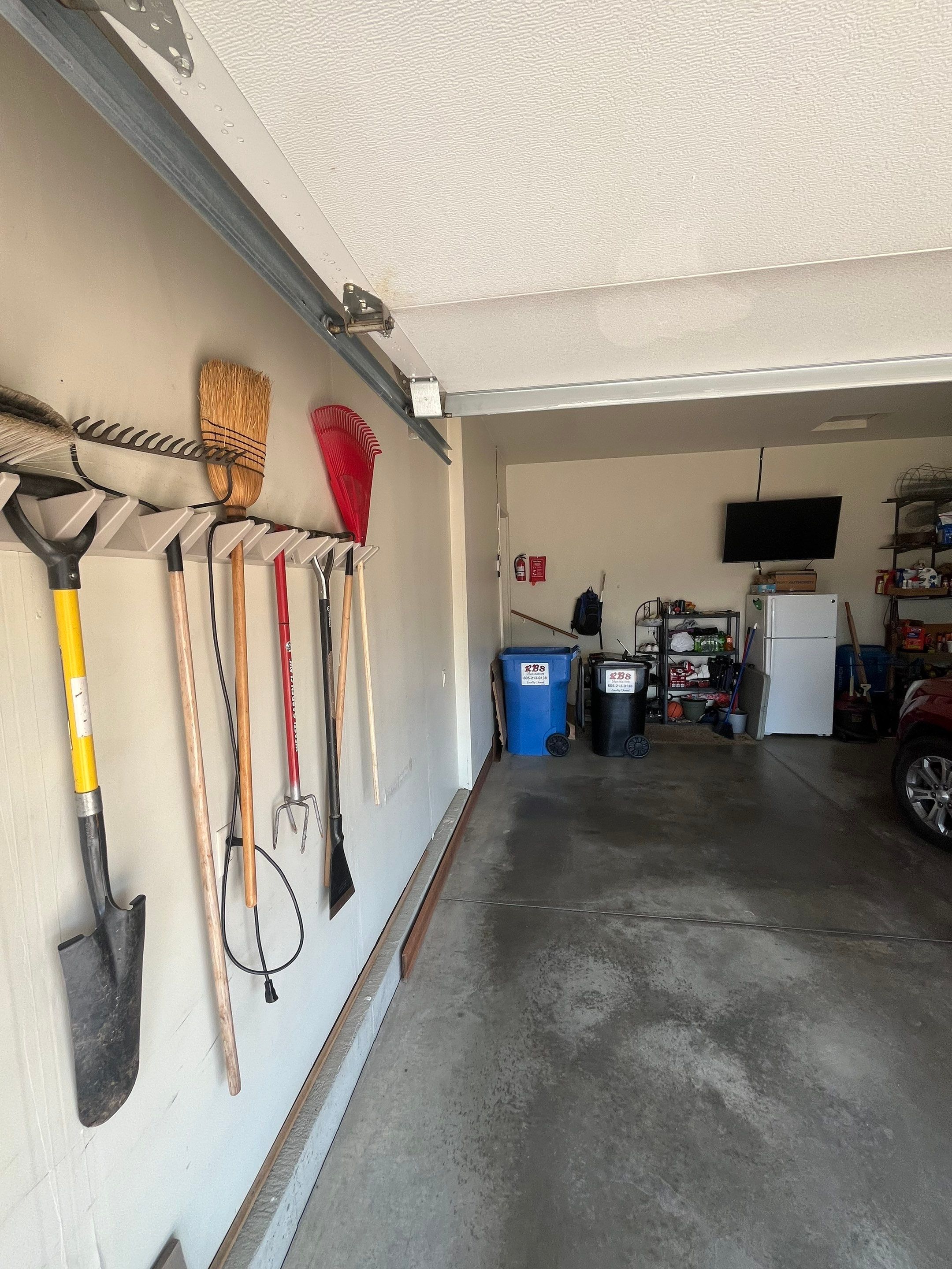 Residential Garage Interior Painting and Drywall Repair in Tea by Select Painting, Coatings & Garage Cabinets