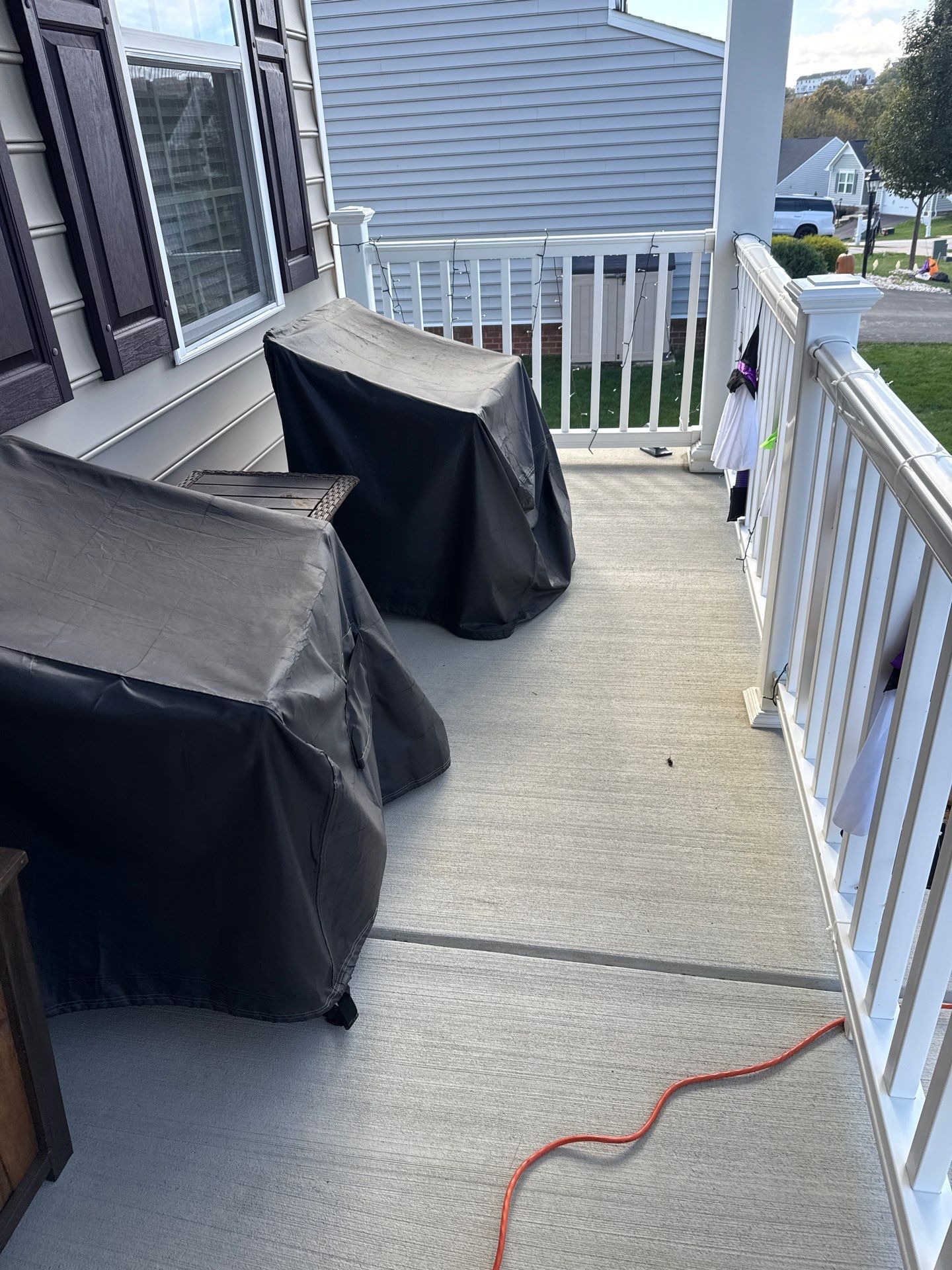 Porch + Garage Project in Oakdale by Floors in a Day, Inc