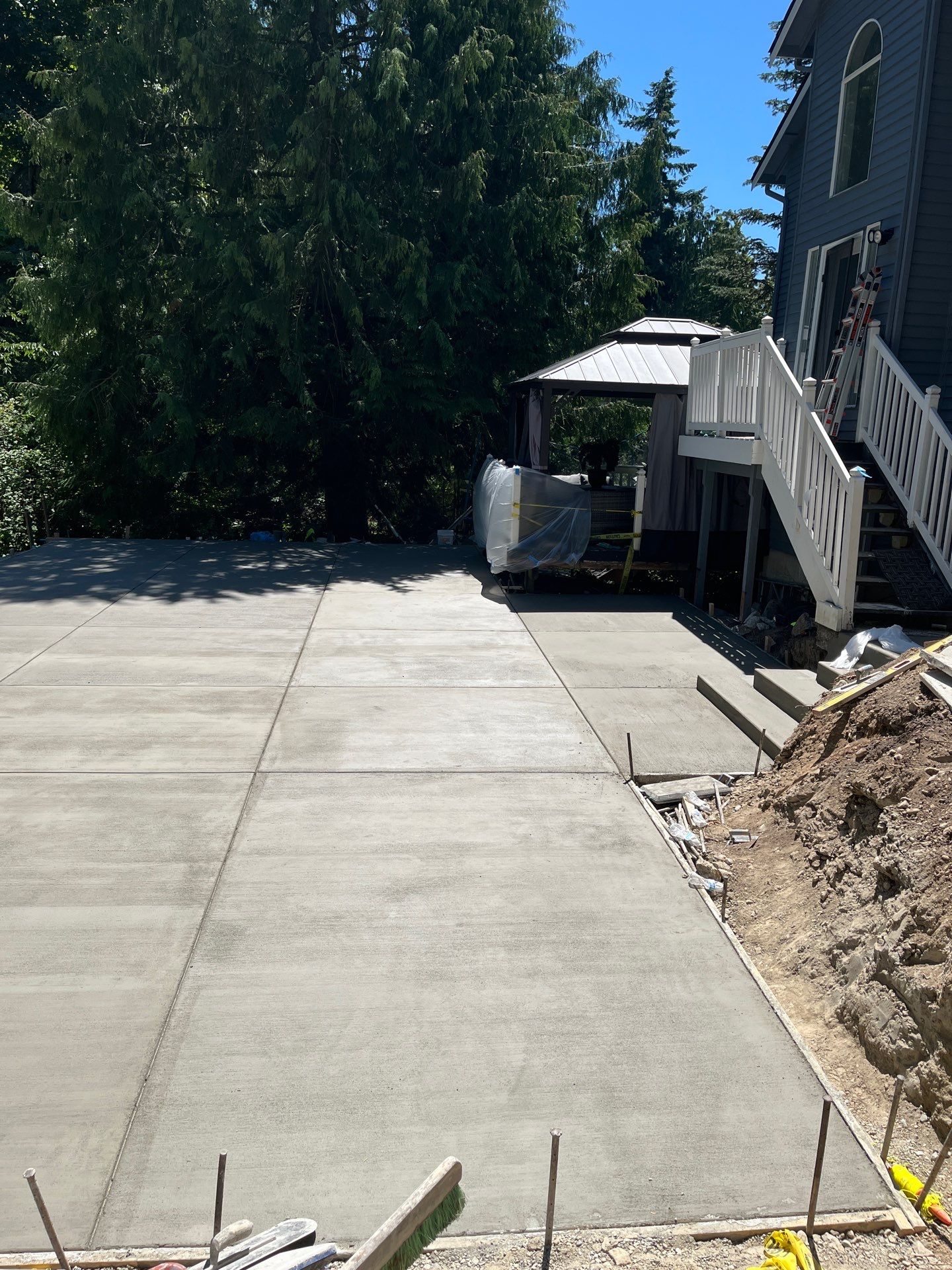 Concrete Back Patio Makeover  by Jireh Asphalt & Concrete Inc 