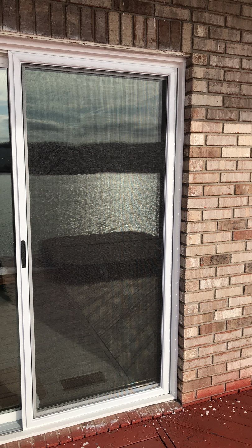 Deck Refurbush and Door Replacement using Trex Decking and Railing. Polaris Patio Doors by Secure Construction Company Inc