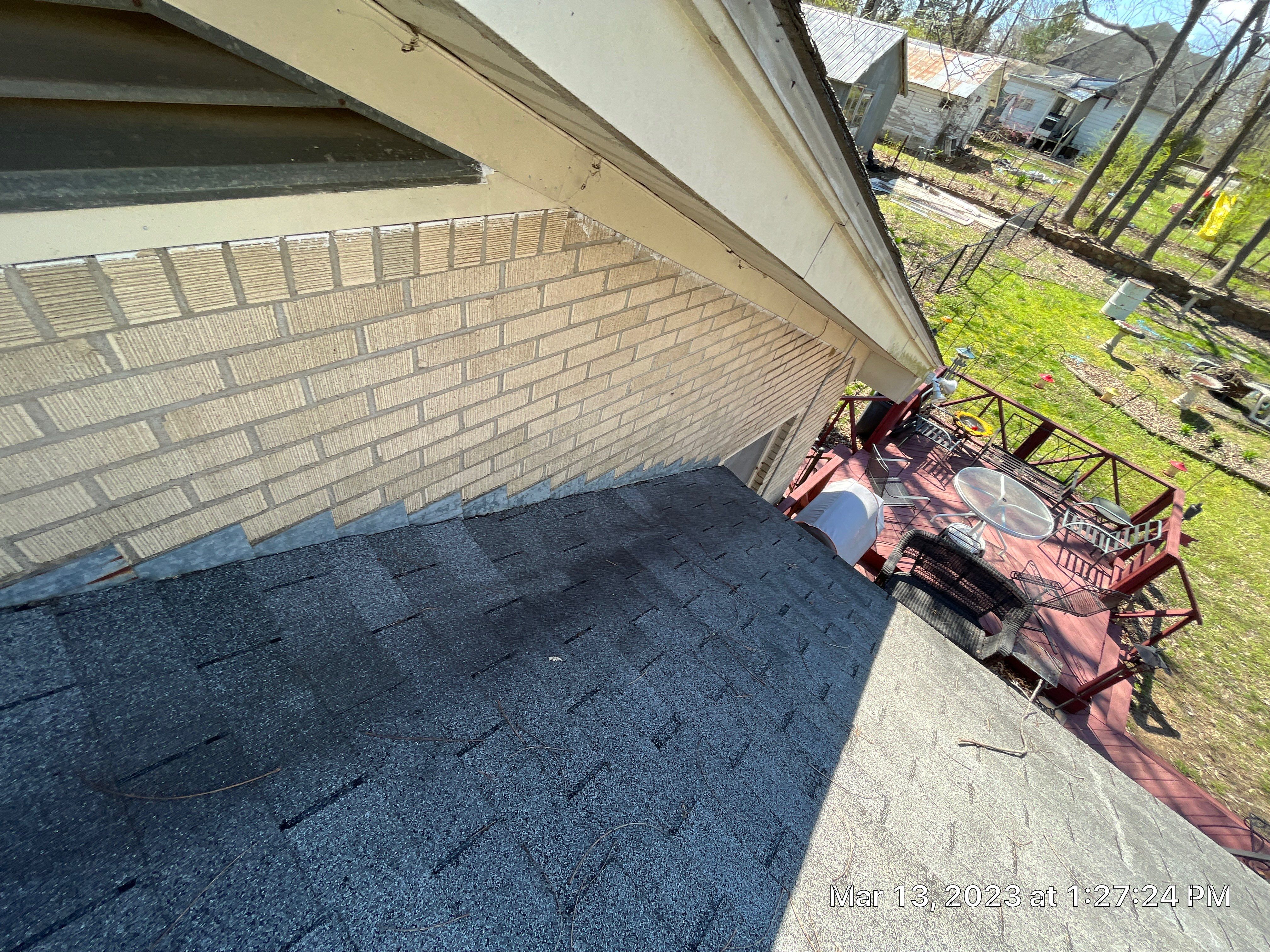 Residential Roofing Installation using 26 Gauge Colored Panels by Hostetler Roofing