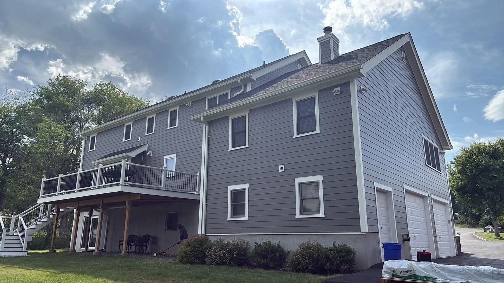 Valhalla Home Exterior Siding Remodel and Custom Window Trim Installation by Ideal Siding 