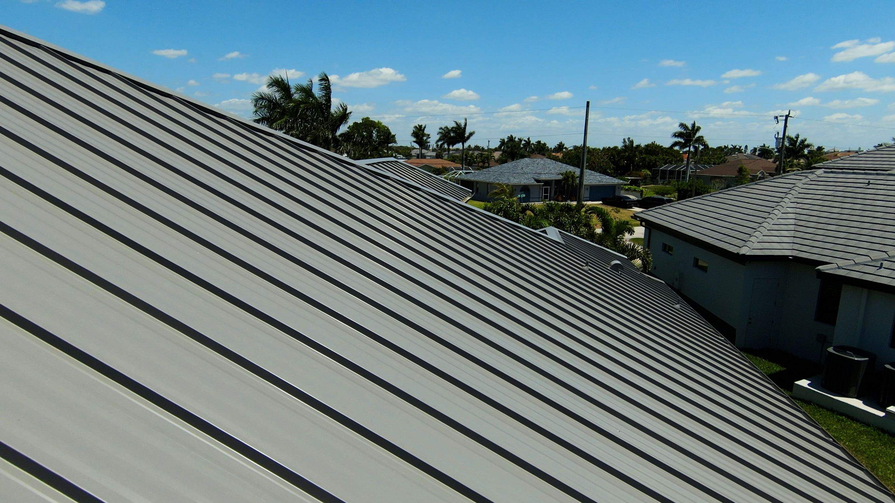 Residential Roofing Installation using Gulf Coast Metals Gulf Seam Panels by Four Peaks Roofing