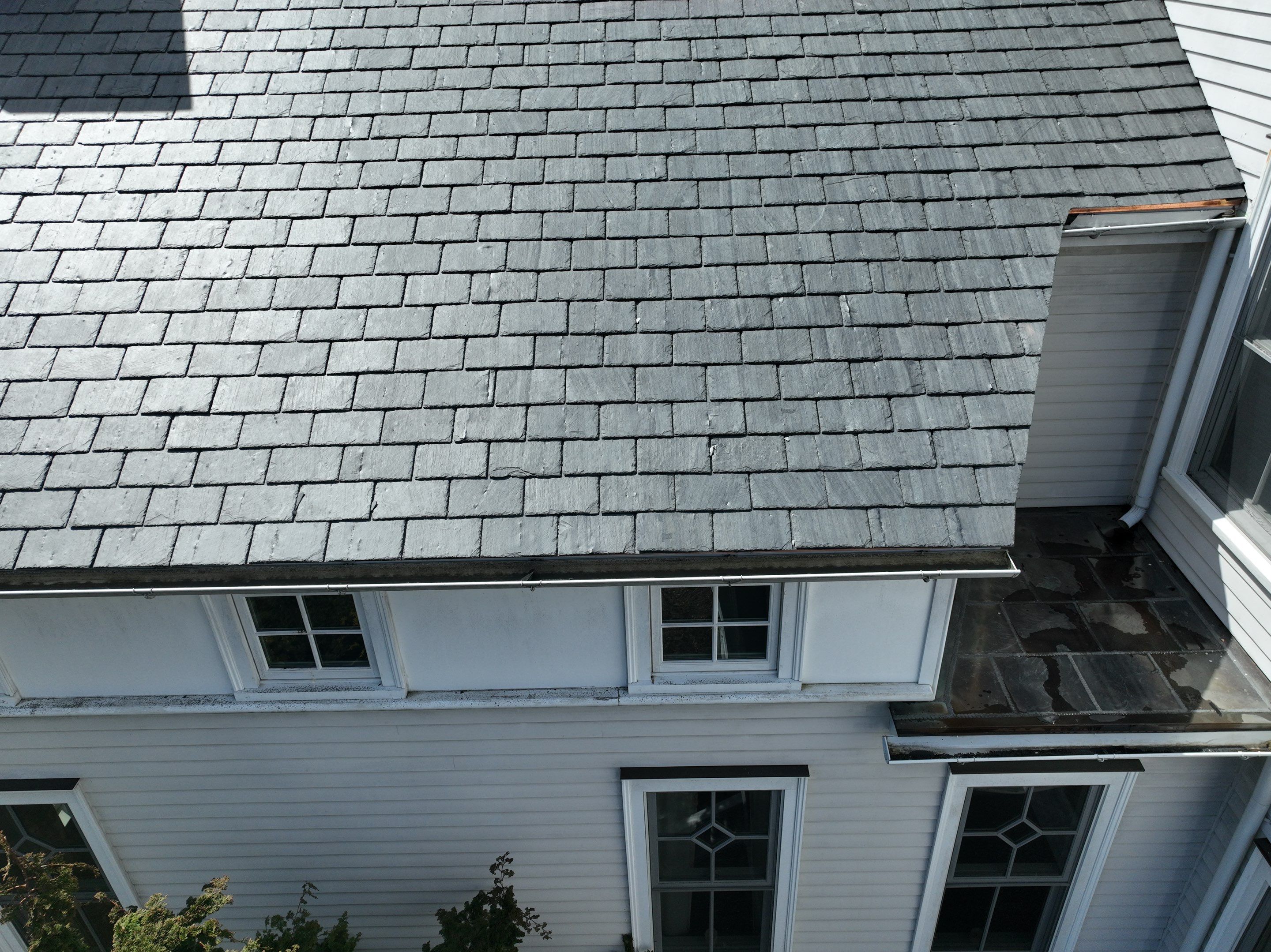 Residential Roofing Installation using Vermont Slate by A Plus Exterior