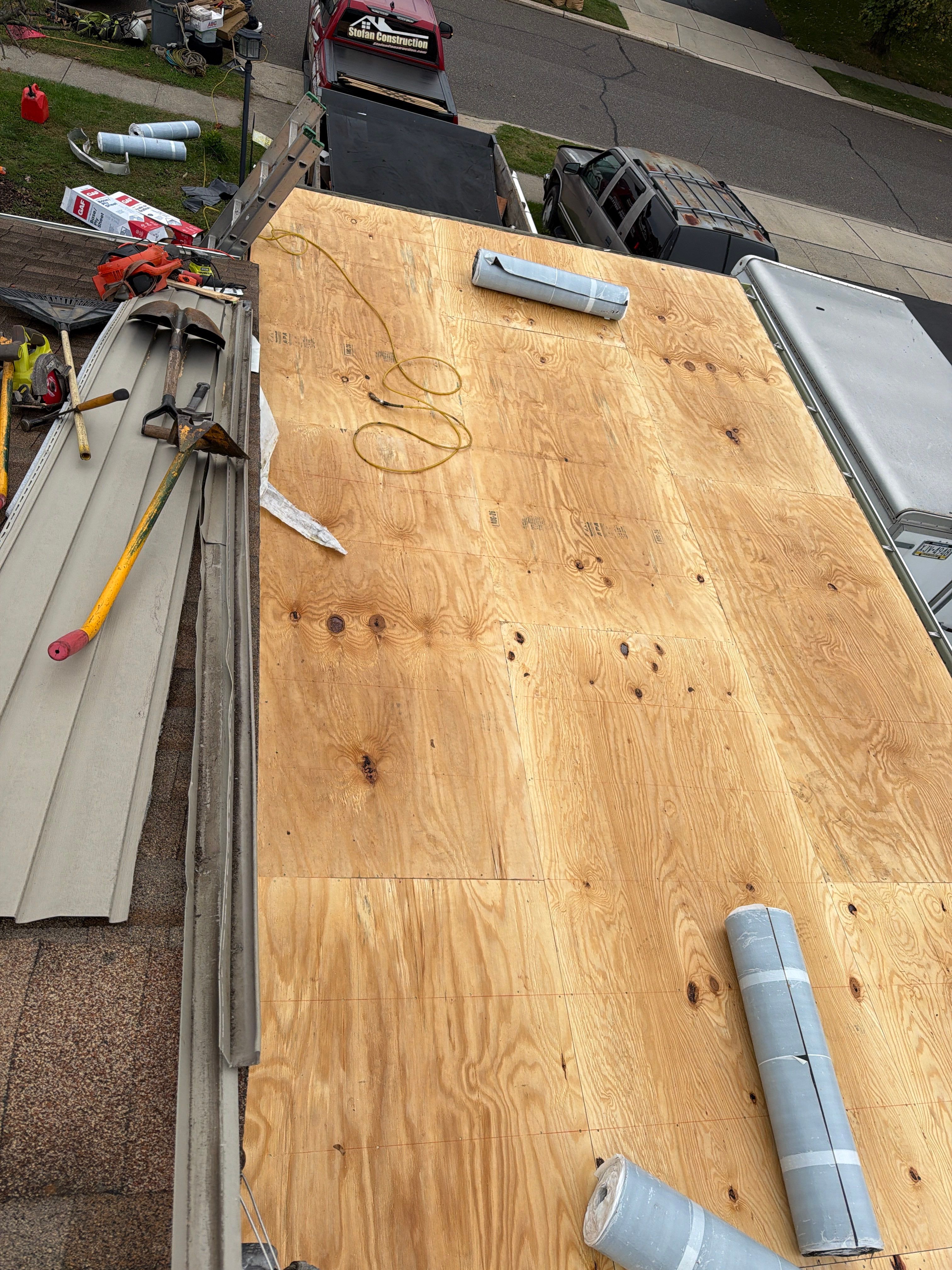 Flat Roof Replacement and Shingle Integration in Levittown by Stofan Construction LLC