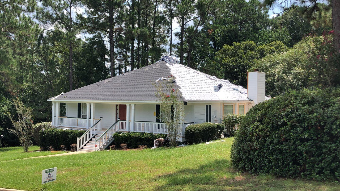 Residential Roofing Installation using Roof Replacement by American Roofing & Construction LLC