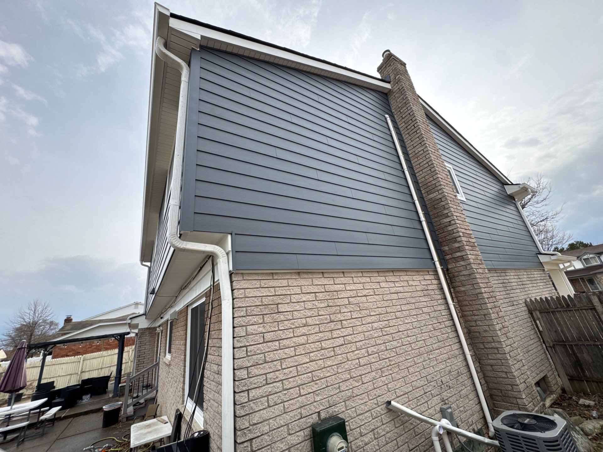 Siding Replacement using Alside Midnight Blue by 180 Contractors