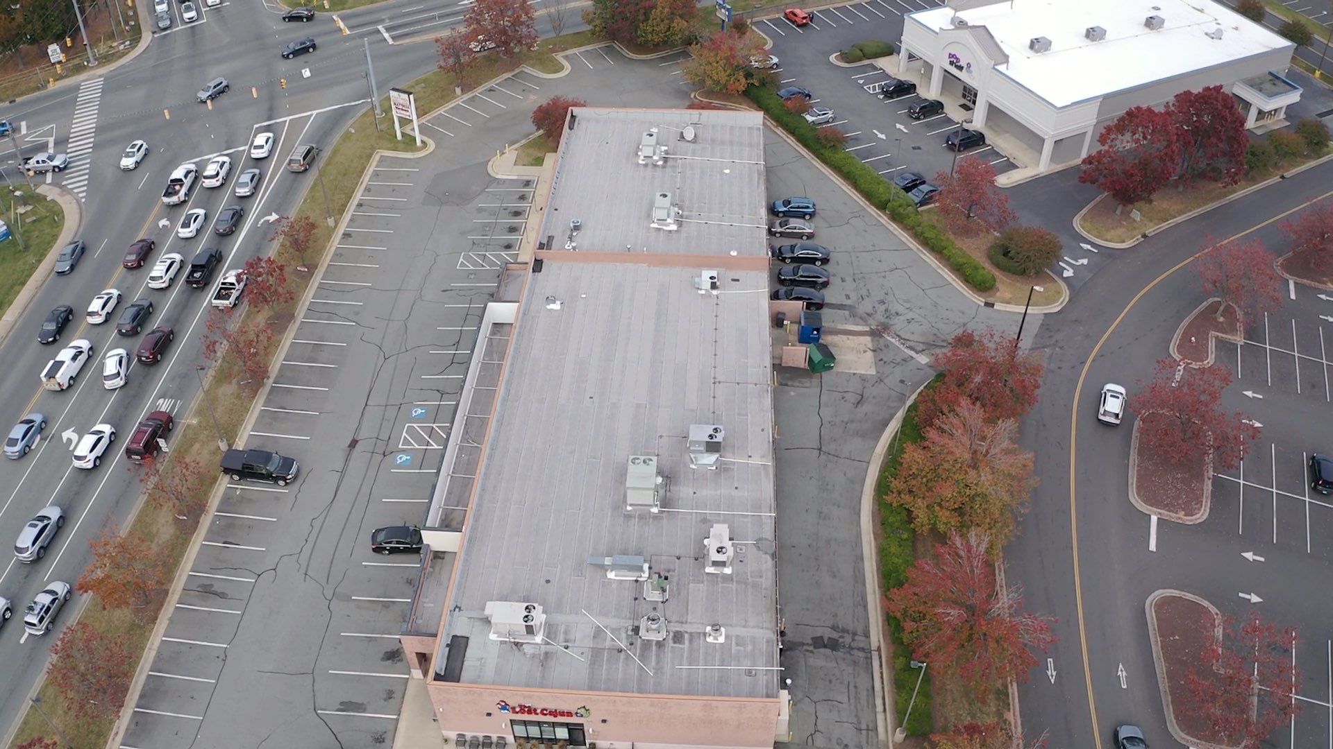 Commercial Coating using Poly Urerthane and Silicone Coating by Just In Time Roofing and Restoration