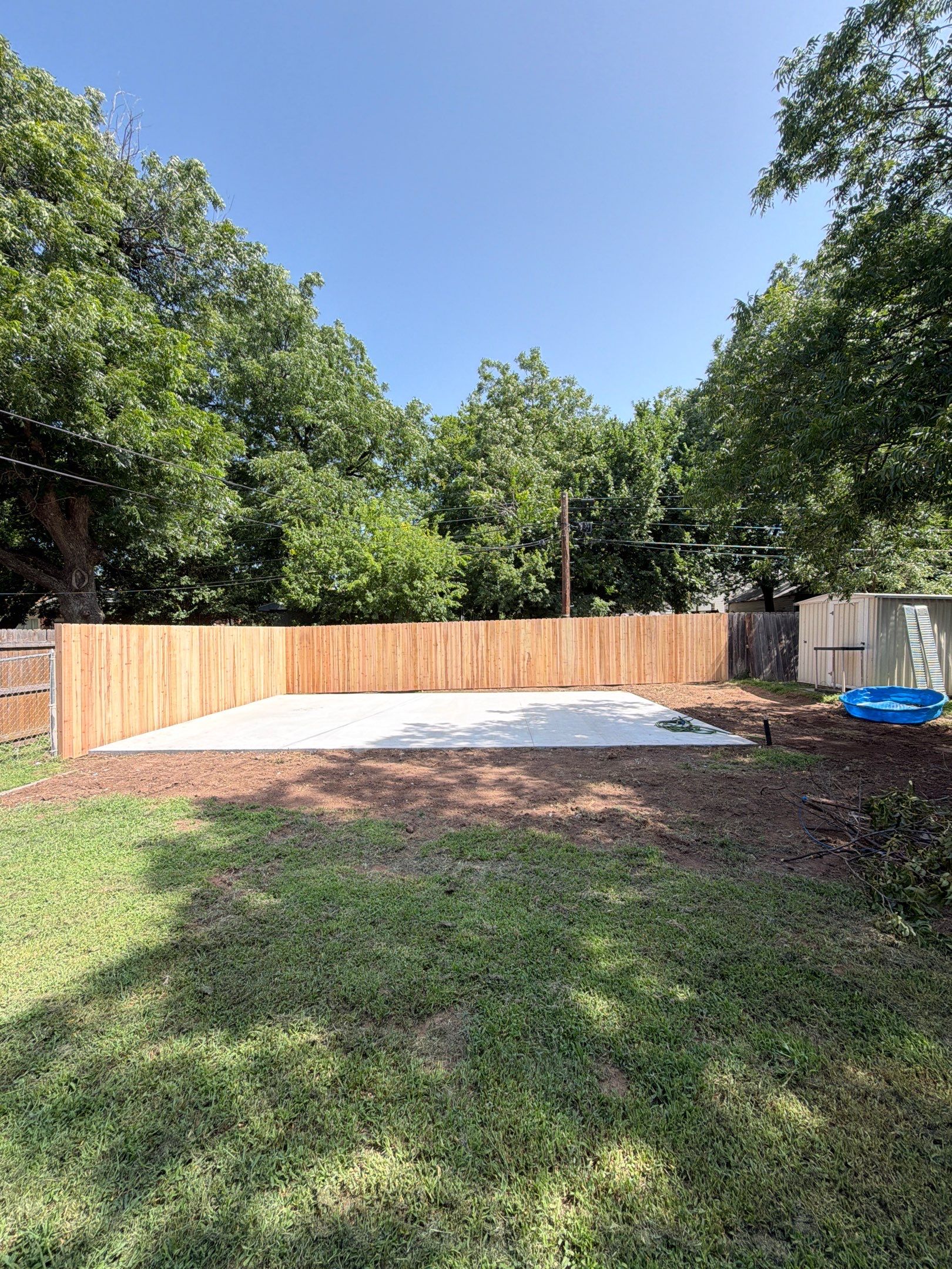 Demo , Concrete Pad, And Cedar Fence by Clays Services Inc