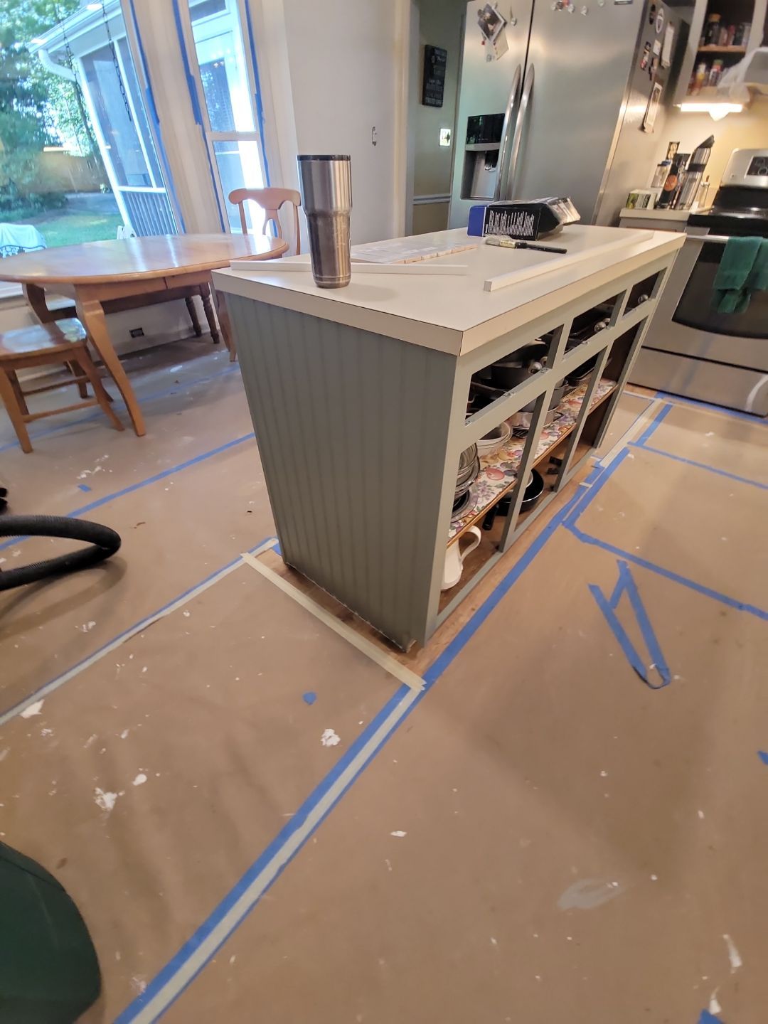A Pathway to Personality – A Two-Tone Kitchen Transformation in Apex by Elite Remodeling and Design LLC