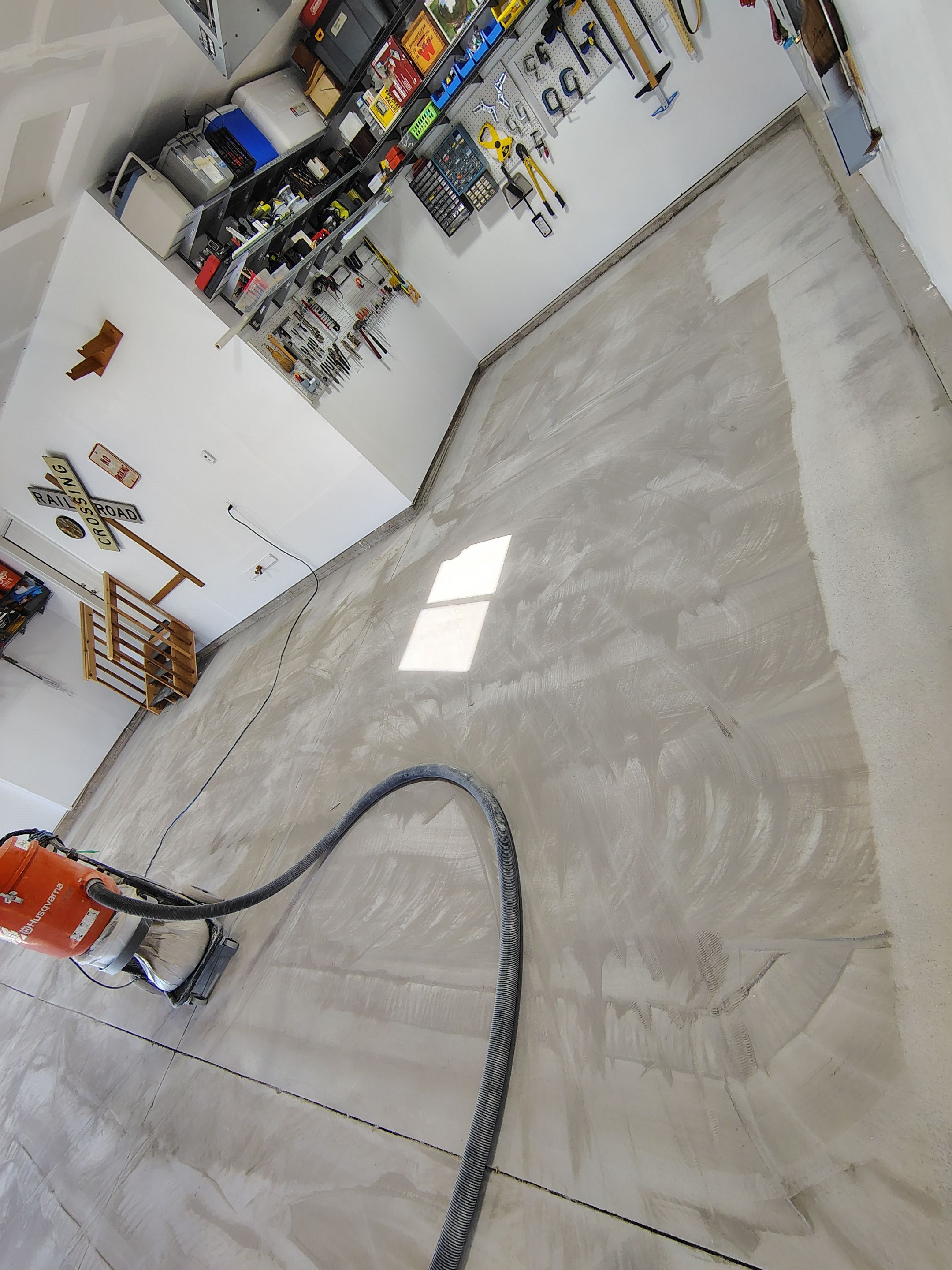 Decorative Flake Garage Floor Coating Installation in Tea, South Dakota by Select Painting, Coatings & Garage Cabinets