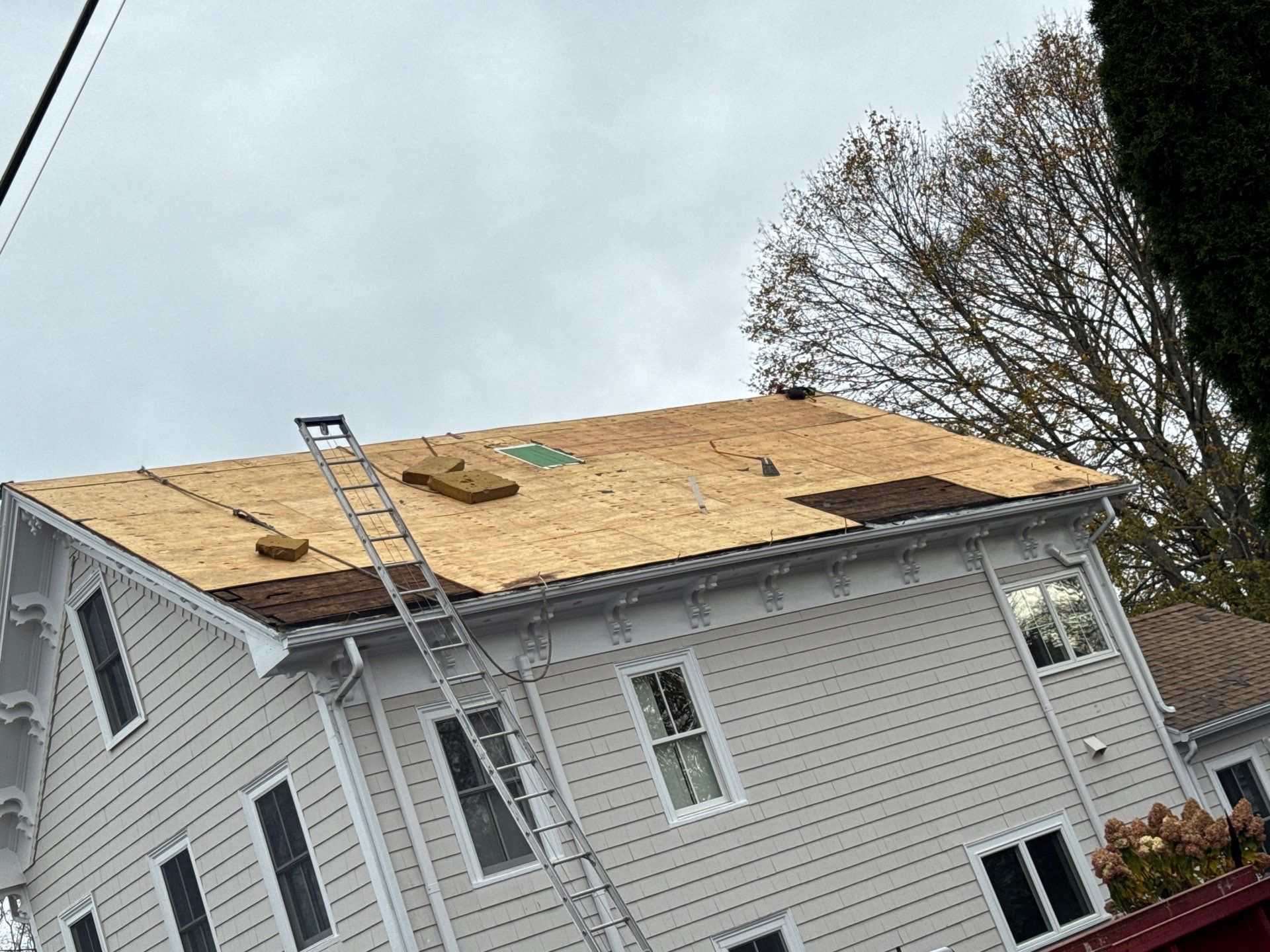 Newburyport Complete Roof Replacement with Solar Venting Skylight by Mighty Dog Roofing of Greater Middlesex County
