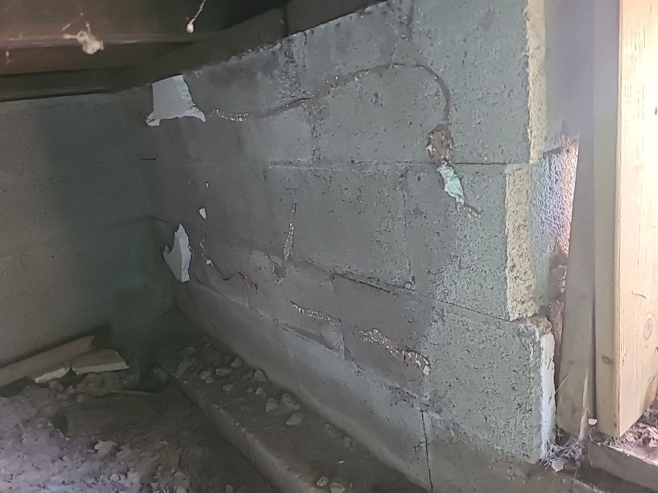 Lifting Home With Piers using Magnum Piers by Toledo Basement Repair