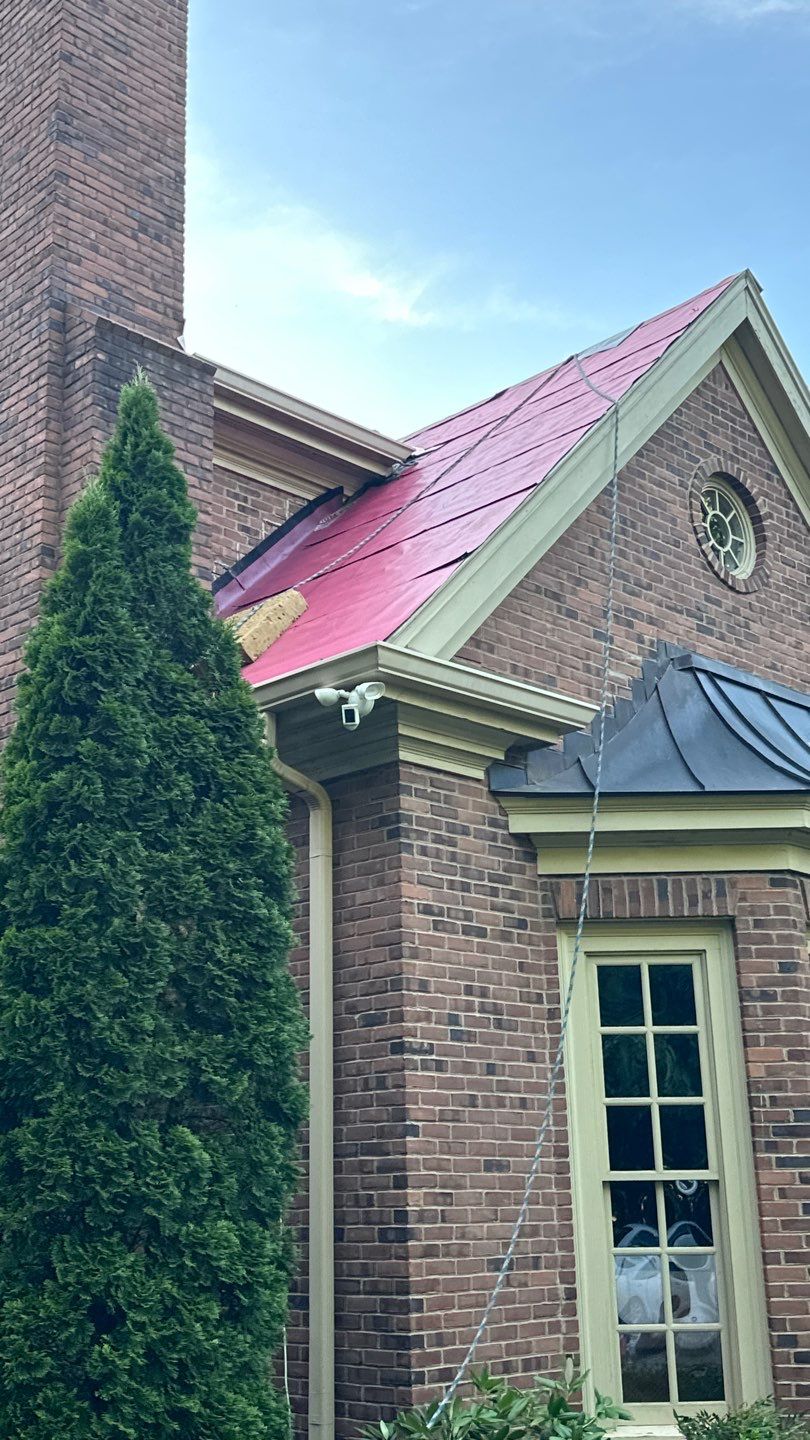 Residential Roofing Installation Using Enviroshake Synthetic Slate by Undersun Roofing 