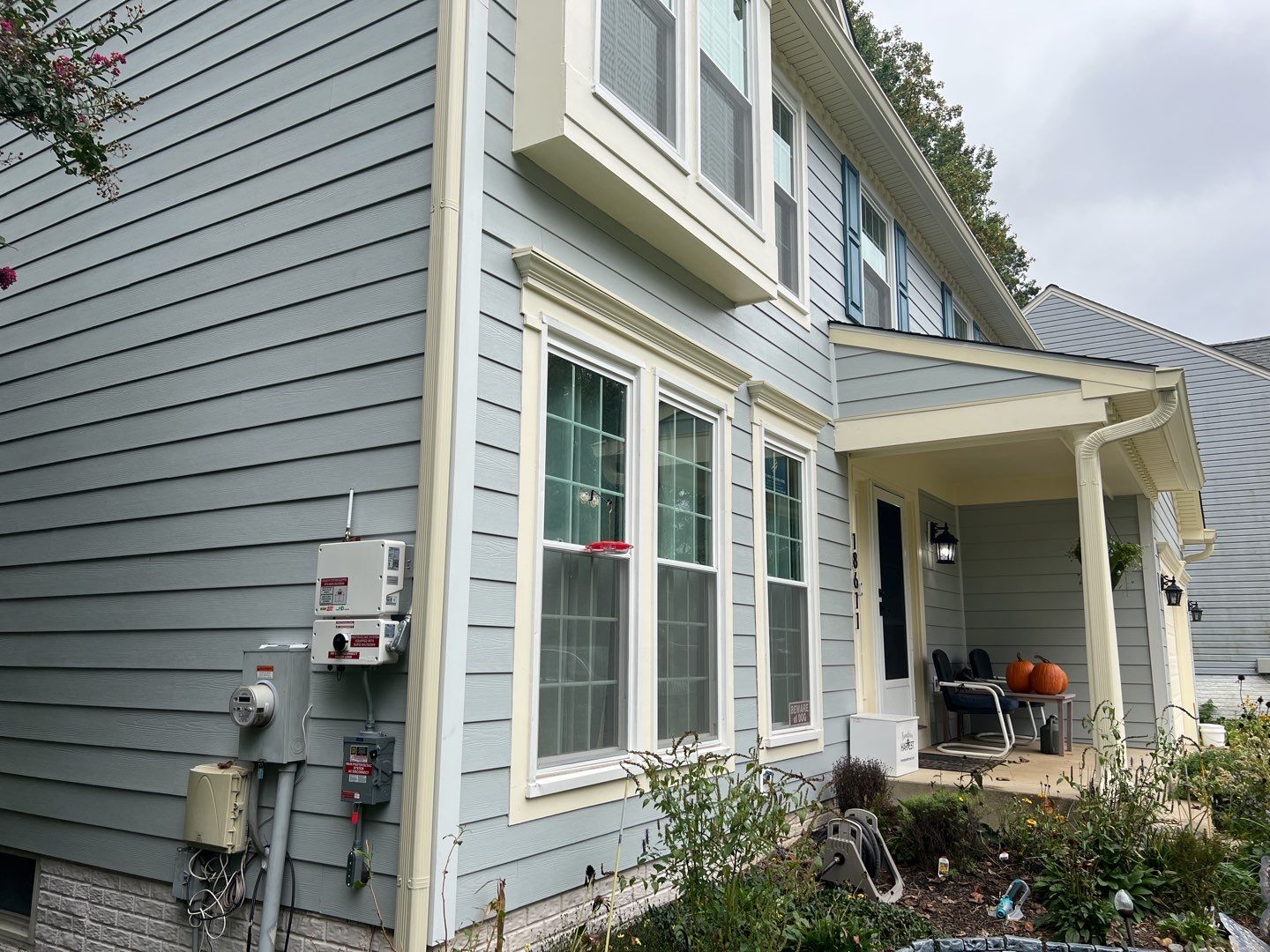 Exterior Home Makeover using GAF Timberline HDZ, GAF Decotech, and James Hardie Siding by American Home Contractors