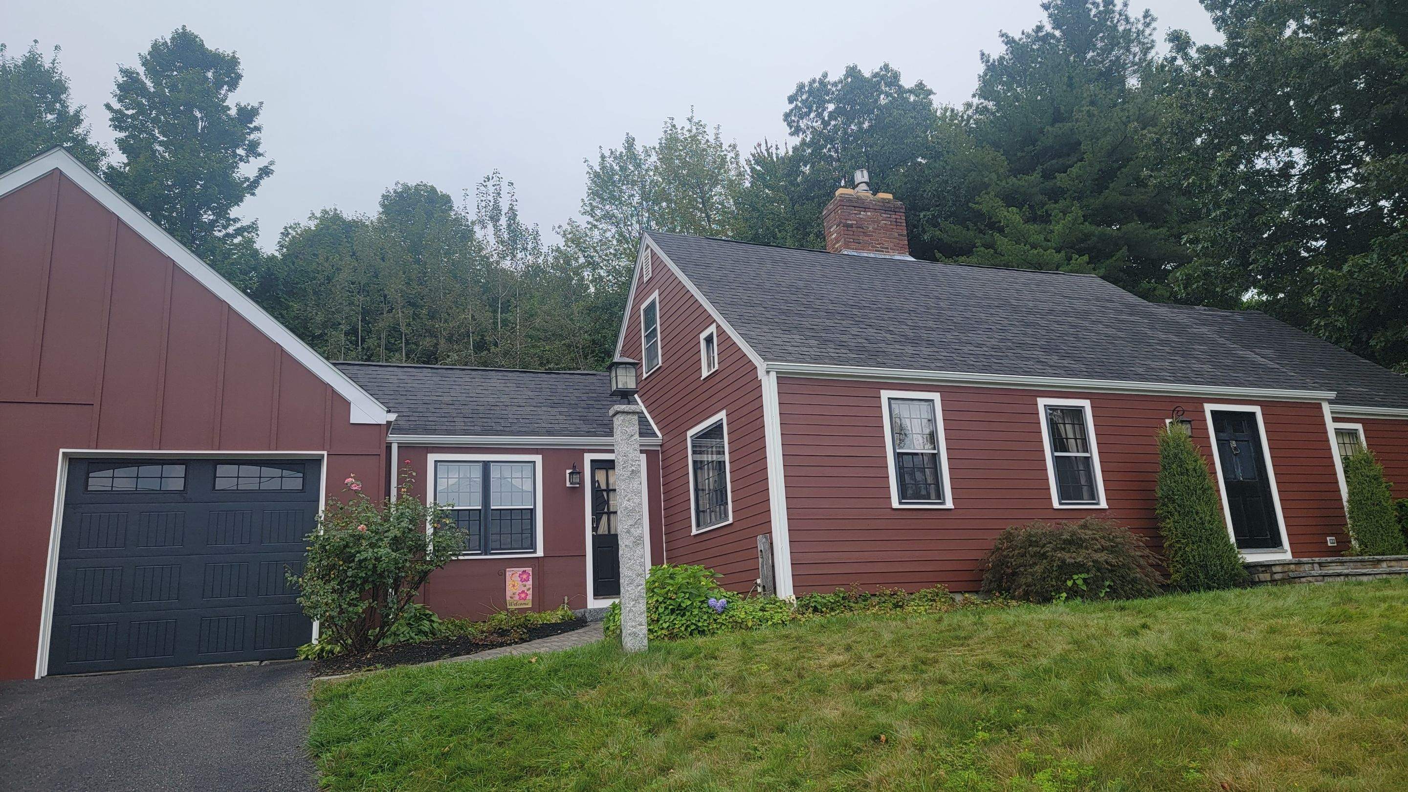 Siding Installation using James Hardie Countrylane red by UBrothers Construction