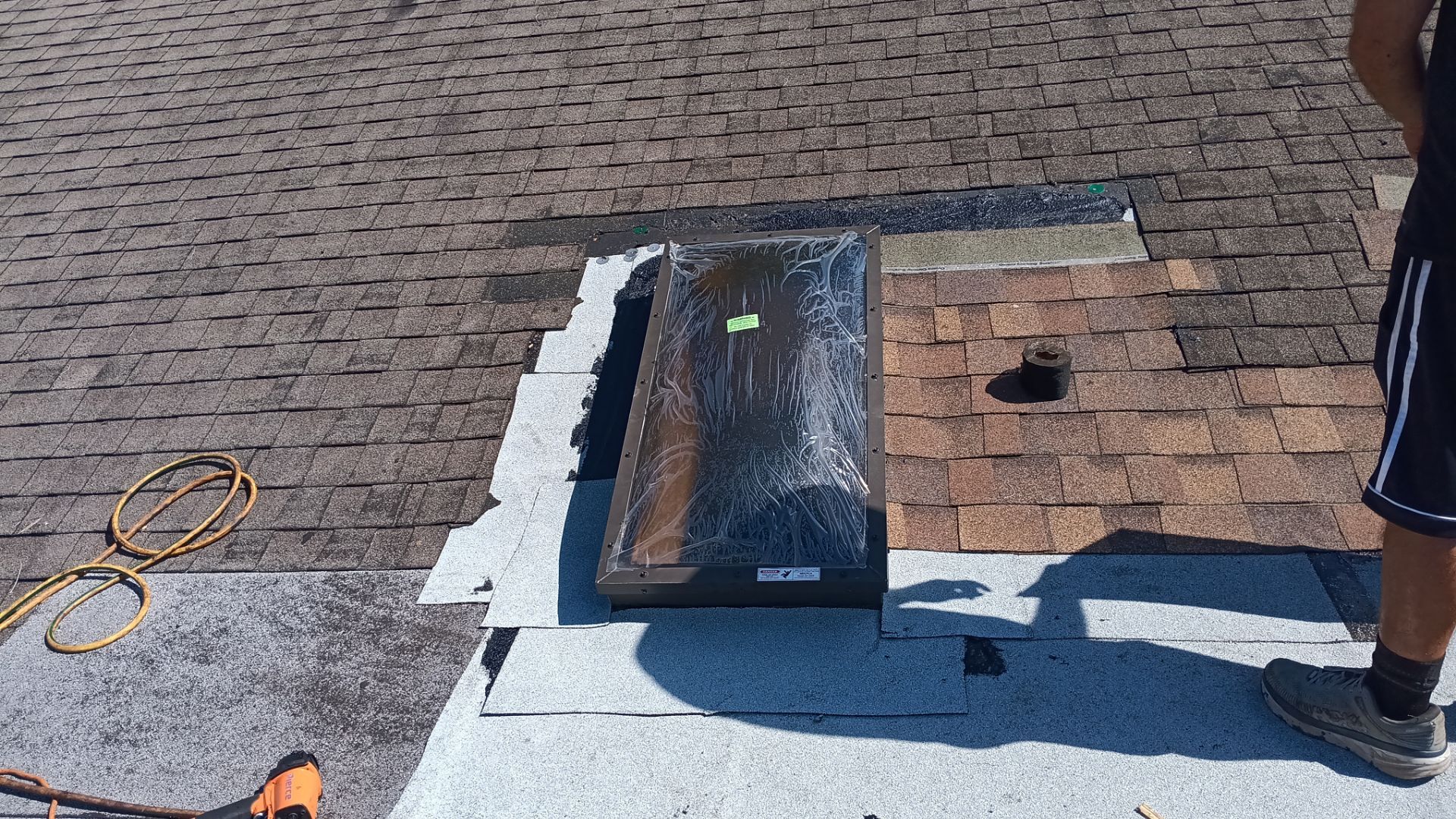 REPLACE NON APPROVED SKYLIGHT ALONG WITH CLOGED GUTTER by Morton Roofing, Inc.