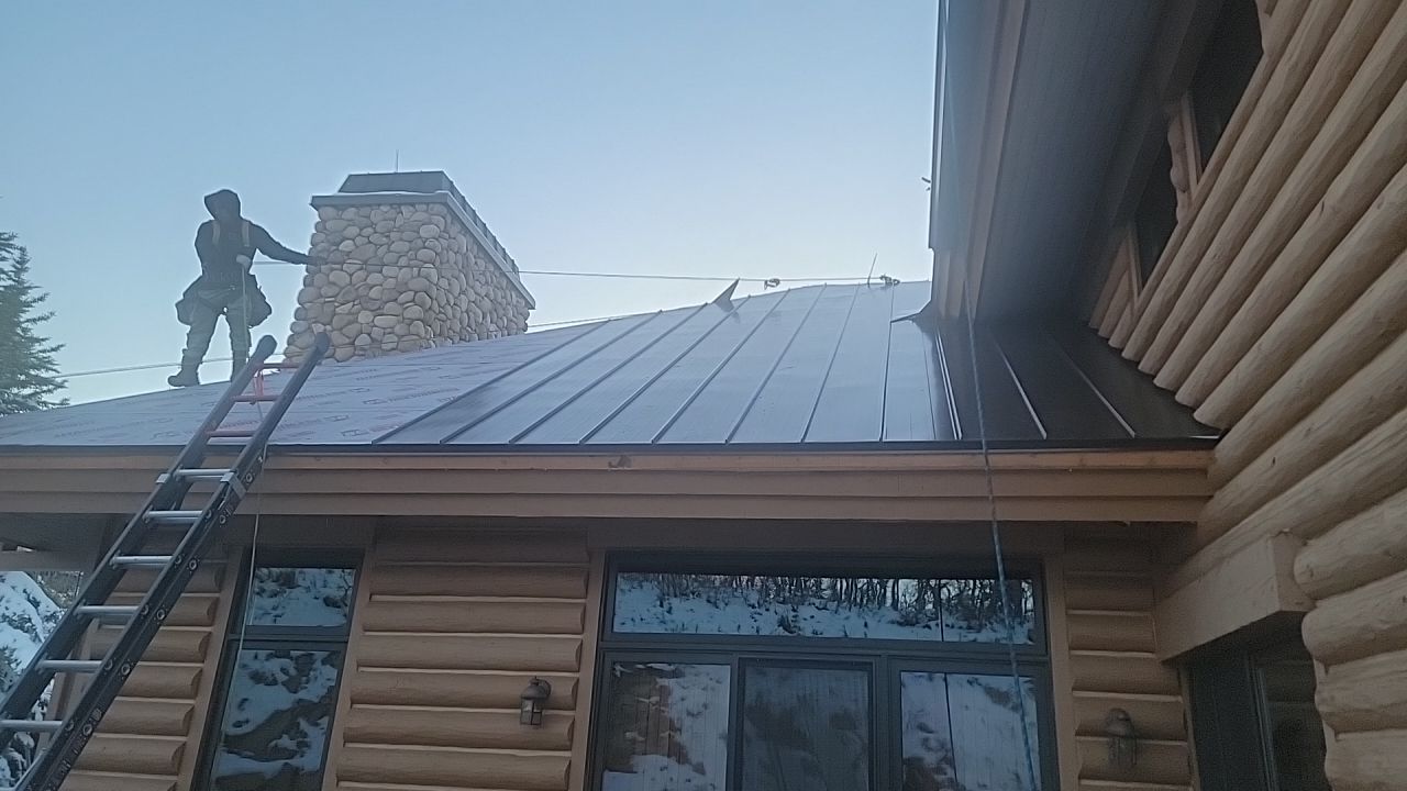 Standing Seam Metal Roof Replacement After Snow Damage by ASAP Roofing & Restoration