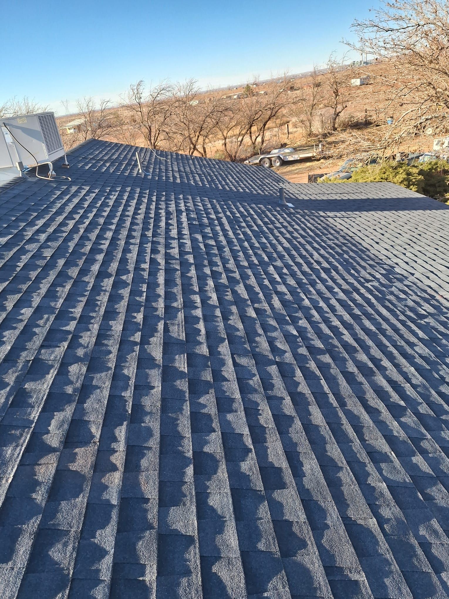 Estate Gray Shingles by Reimagine Roofing