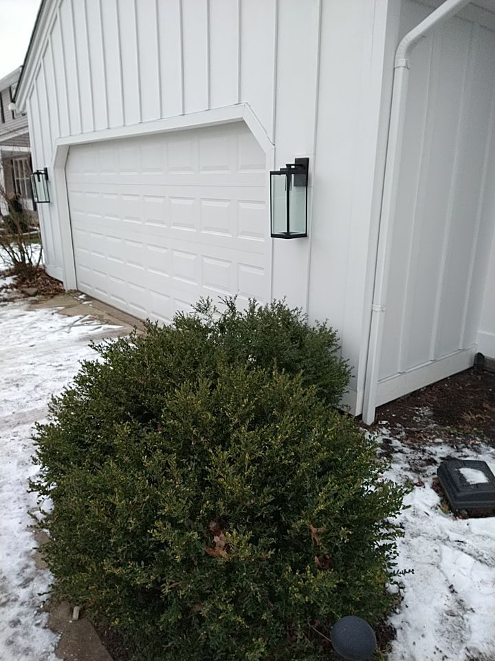 James Hardie Siding  using James Hardie Board and Batten, White by Absolute Roofing and Construction