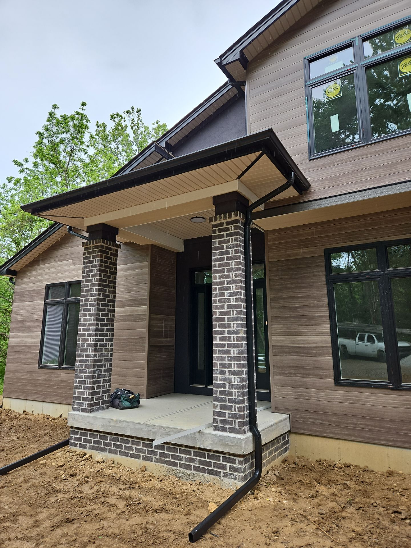 Gutter Installation using 5" Seamless Gutters and Downspouts by RoofX 