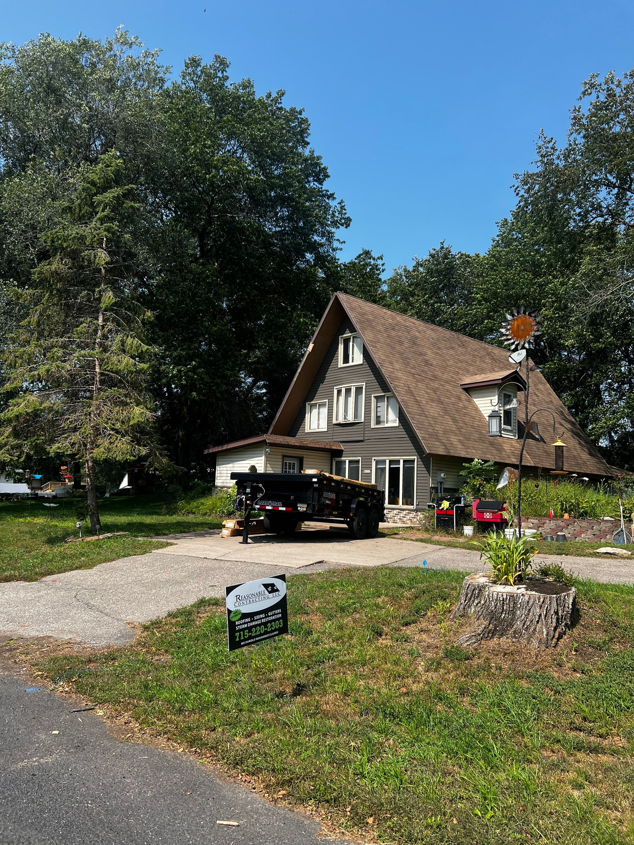 Residential Siding Job-Bay City WI by Reasonable Contracting LLC