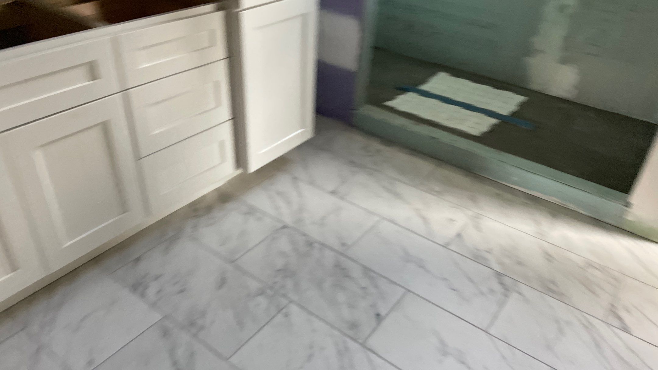 Remodeled Home with new tile floors, Showers and Refinished Oak Floors with stain and Waterbased Finish by Footprints Floors of Coastal Carolina