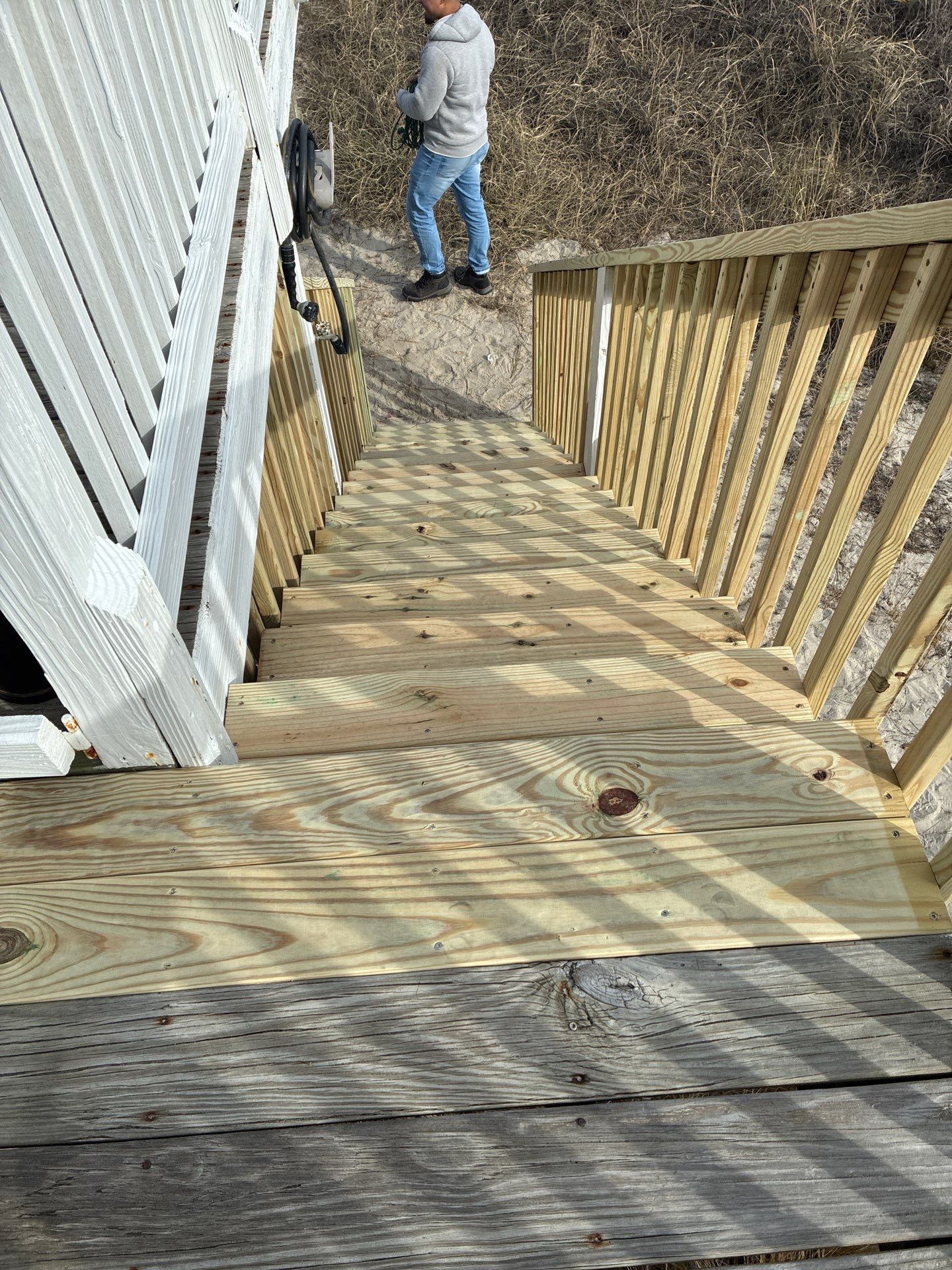 Step Re-build & Handrail Installation – Oak Island, NC by RGR Construction and Roofing, LLC