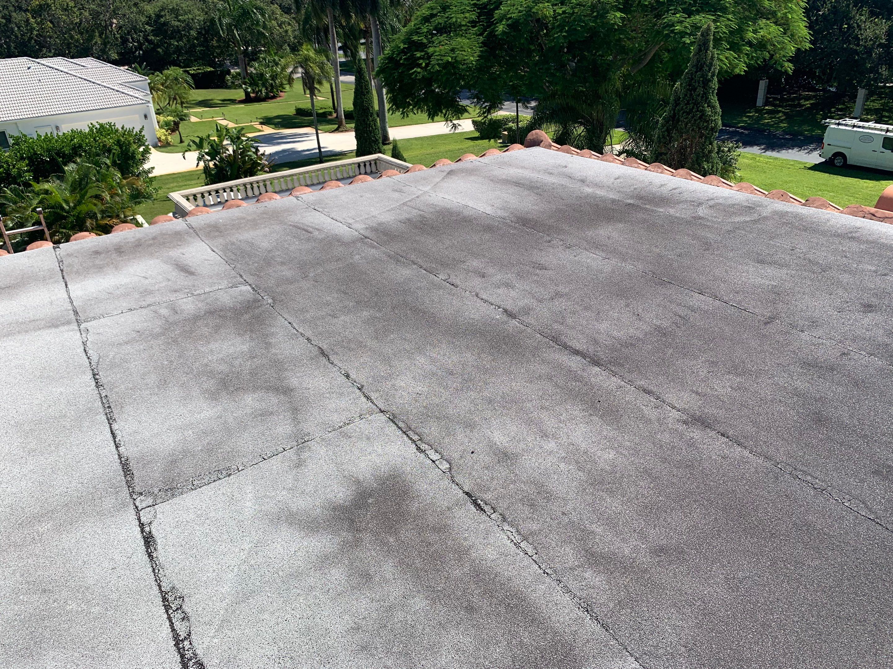 Residential Roofing Installation using Polybrite 90.1 silicone coating by BLUES BROTHERS CONSTRUCTION CORP