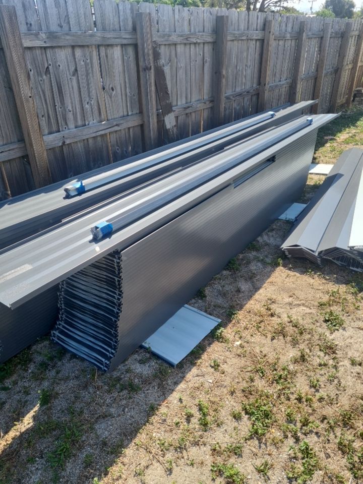 Residential Roofing Installation using 1" Nail strip metal roof by BLUES BROTHERS ROOFING