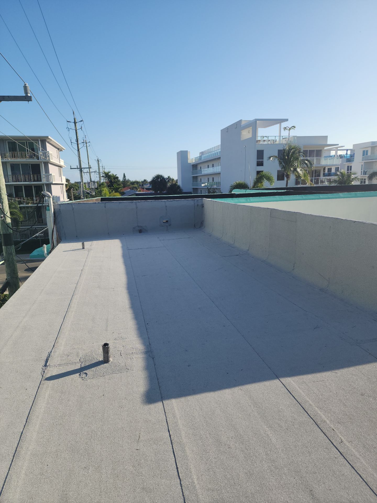Flat Roof Replacement and Insulation Upgrade in Lake Worth Beach by Aastro Roofing