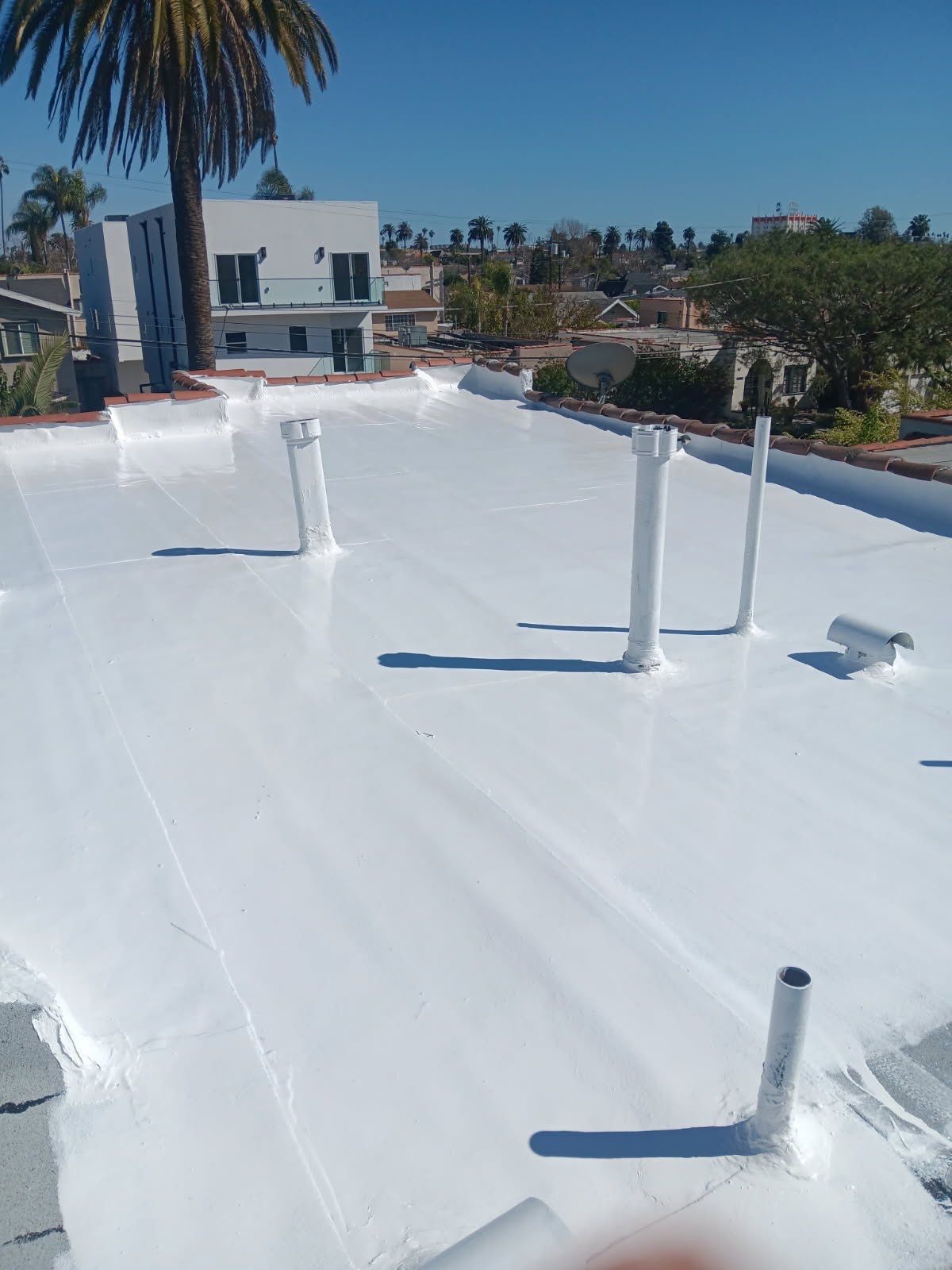 Silicone Membrane Installation using American Standard Coatings Silicone-S by Hull Brothers Roofing